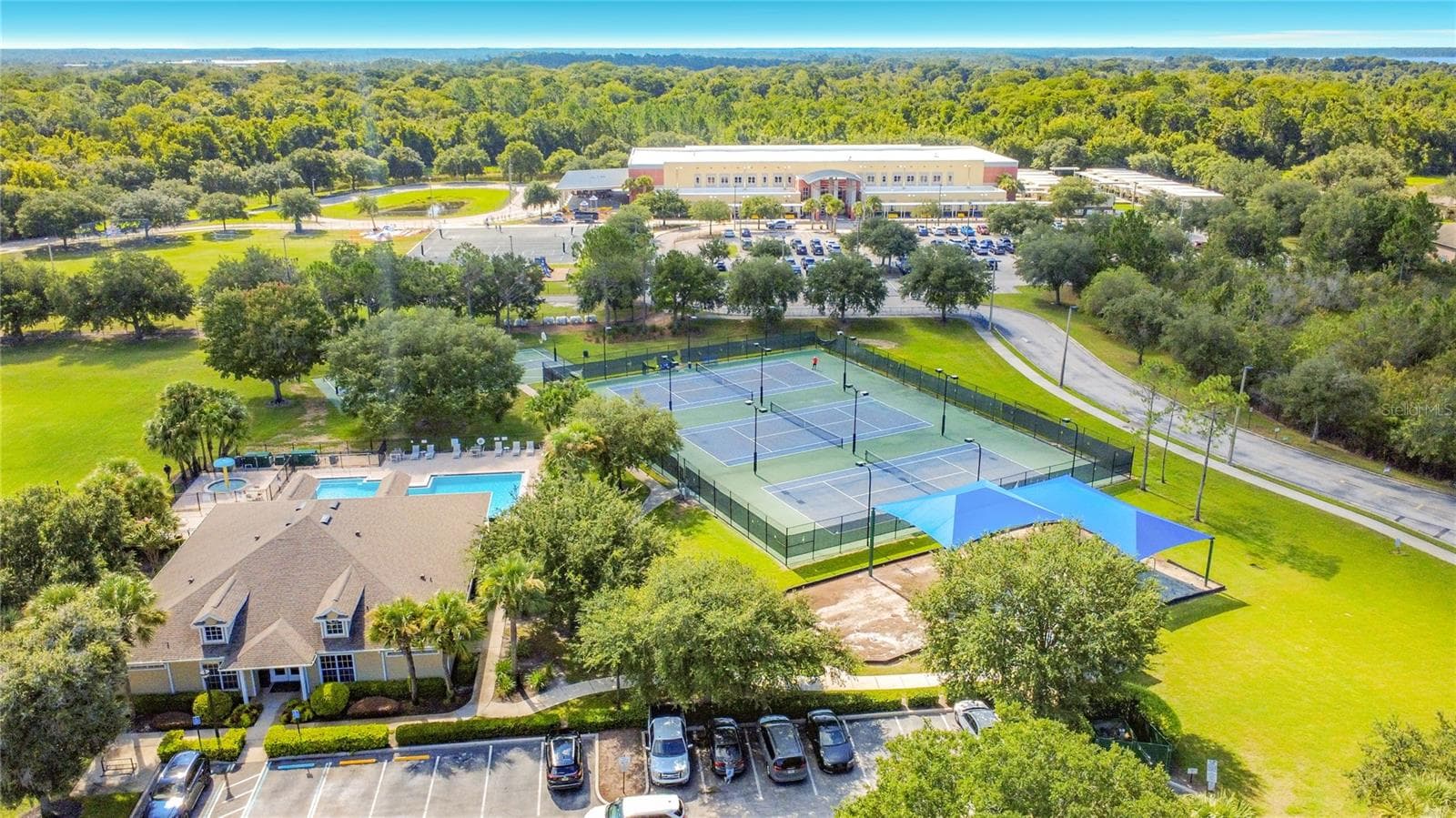 Tennis, basketball, baseball, swimming pools, a fitness center, and clubhouse amenities, - 9850 HIDDEN DUNES LN, ORLANDO