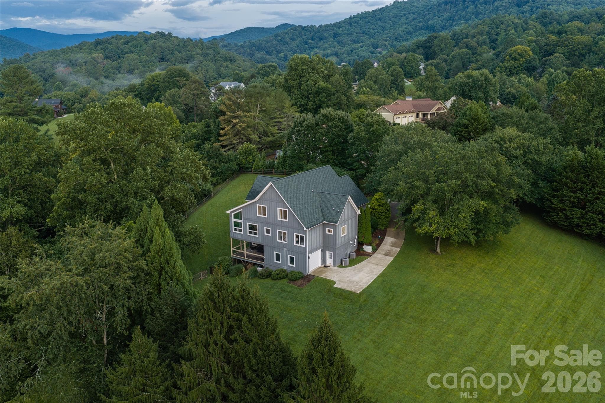 Second driveway to lower level 3rd garage. - 33 Bridle Path Drive, Barnardsville