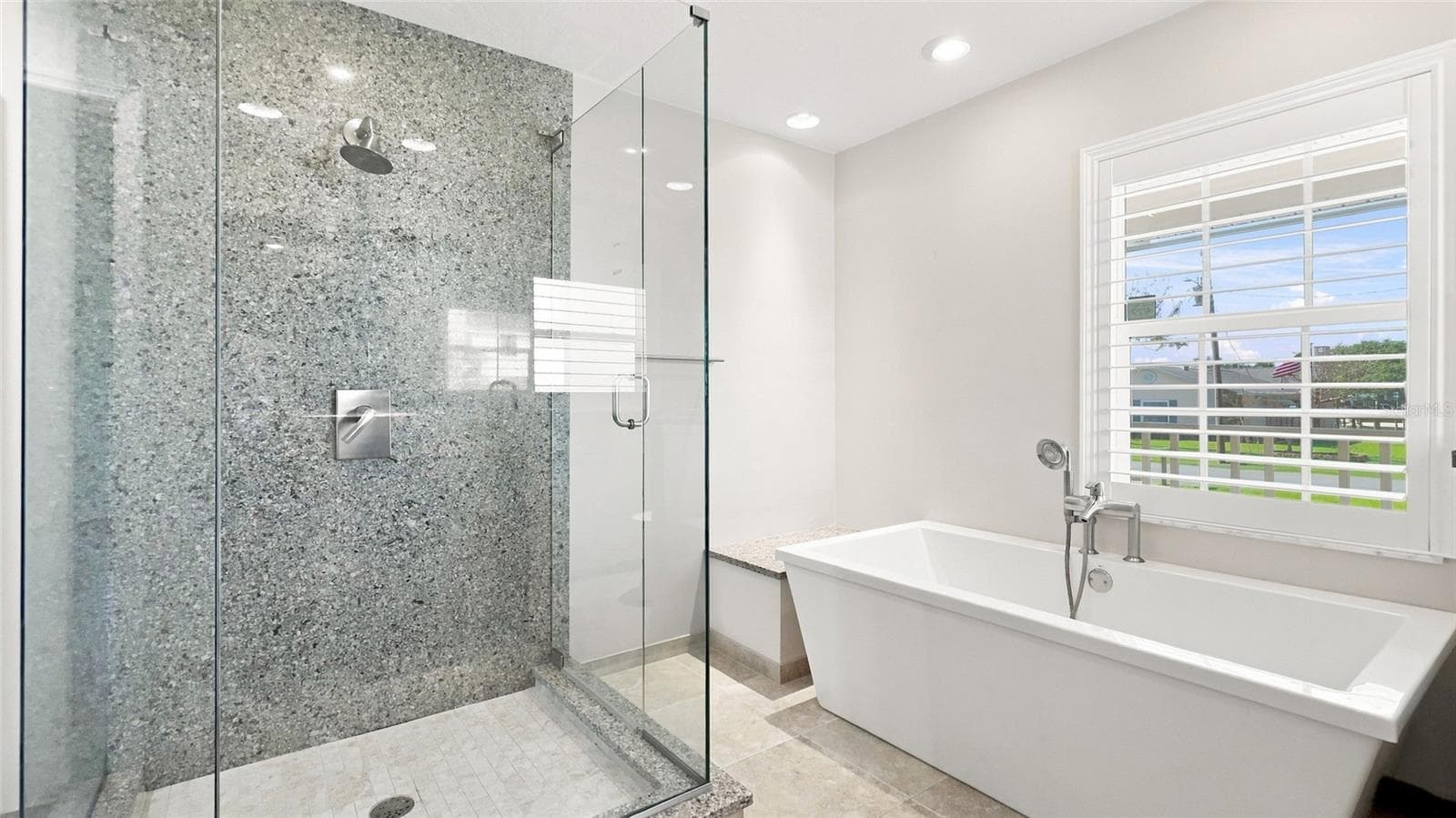 Primary bath tub and walk in shower - 342 N 12TH ST, FLAGLER BEACH