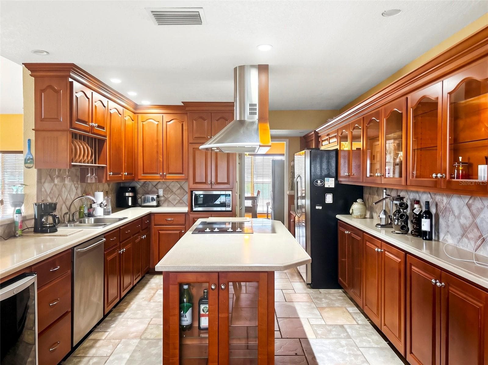 CUSTOM KITCHEN HAND CRAFTED BY MASTER CARPENTERS. WINE COOLER, AMPLE STORAGE - 936 ALLEGRO LN, APOLLO BEACH