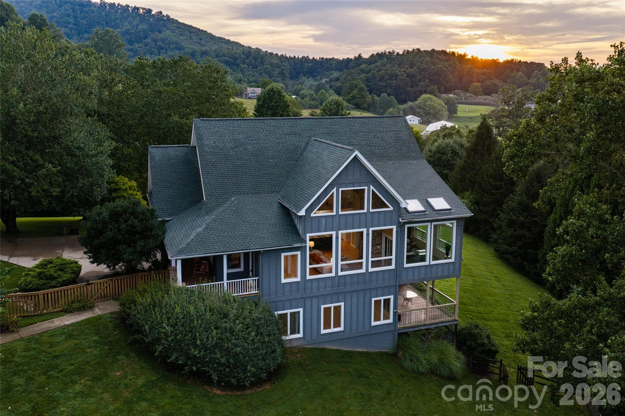 The home captures welcoming mountain views that change with the seasons - 33 Bridle Path Drive, Barnardsville