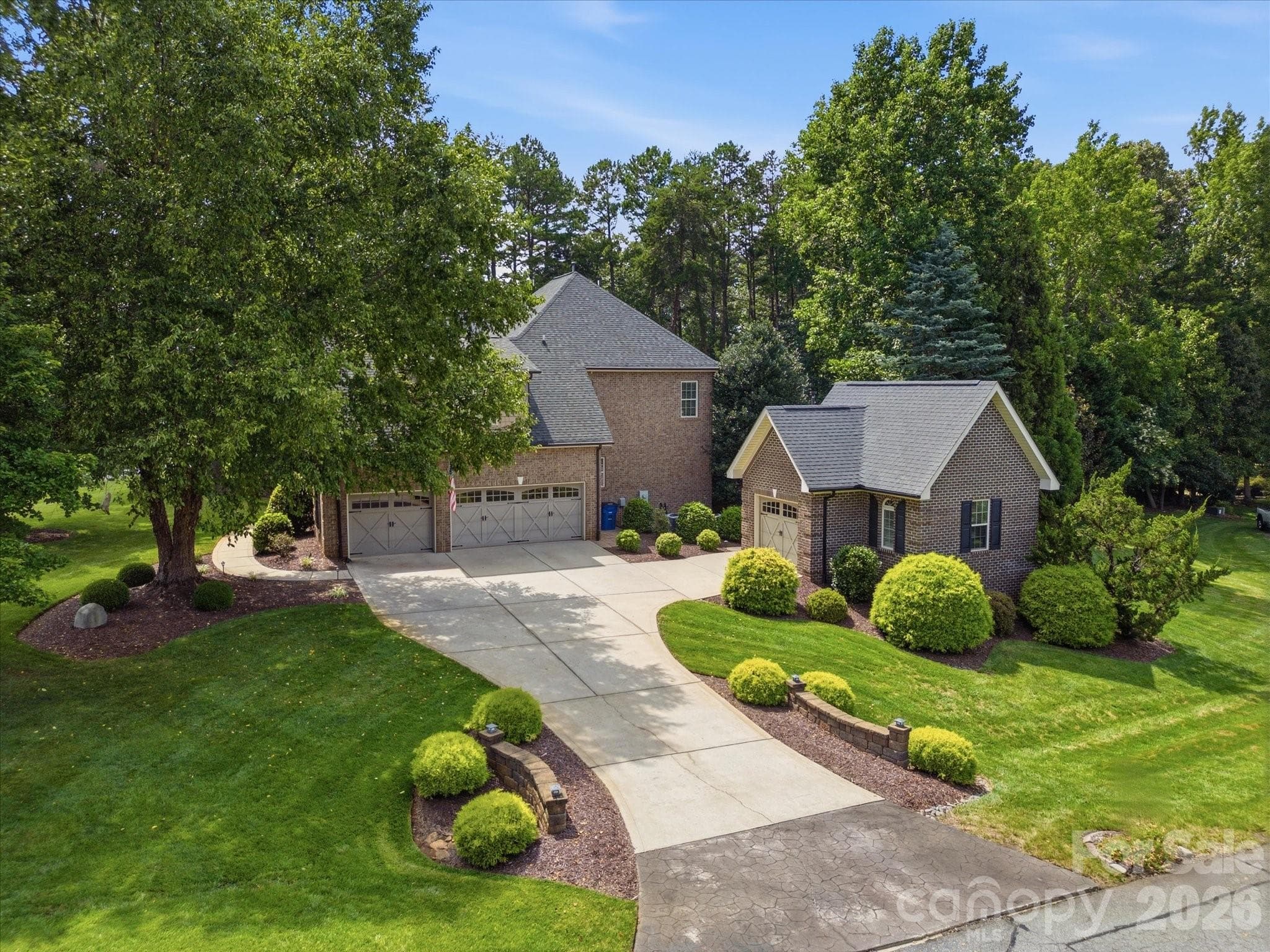 3 car attached garage and 1 car detached garage - 1023 Madras Court, Davidson