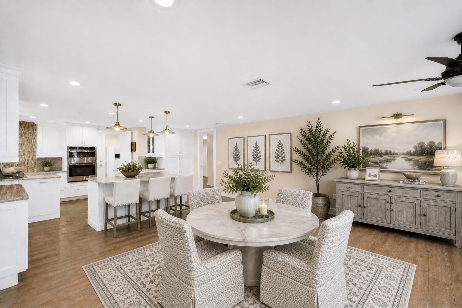 Informal Dining Area in Great Room/Kitchen-Virtually Staged - 1100 FRIENDLY WAY S, ST PETERSBURG
