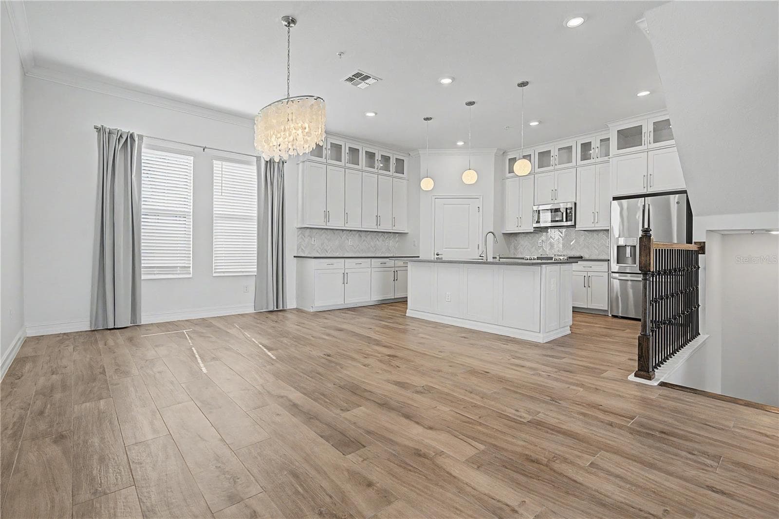 Second-level kitchen with a bright, open feel. - 5351 BRIDGE ST #38, TAMPA