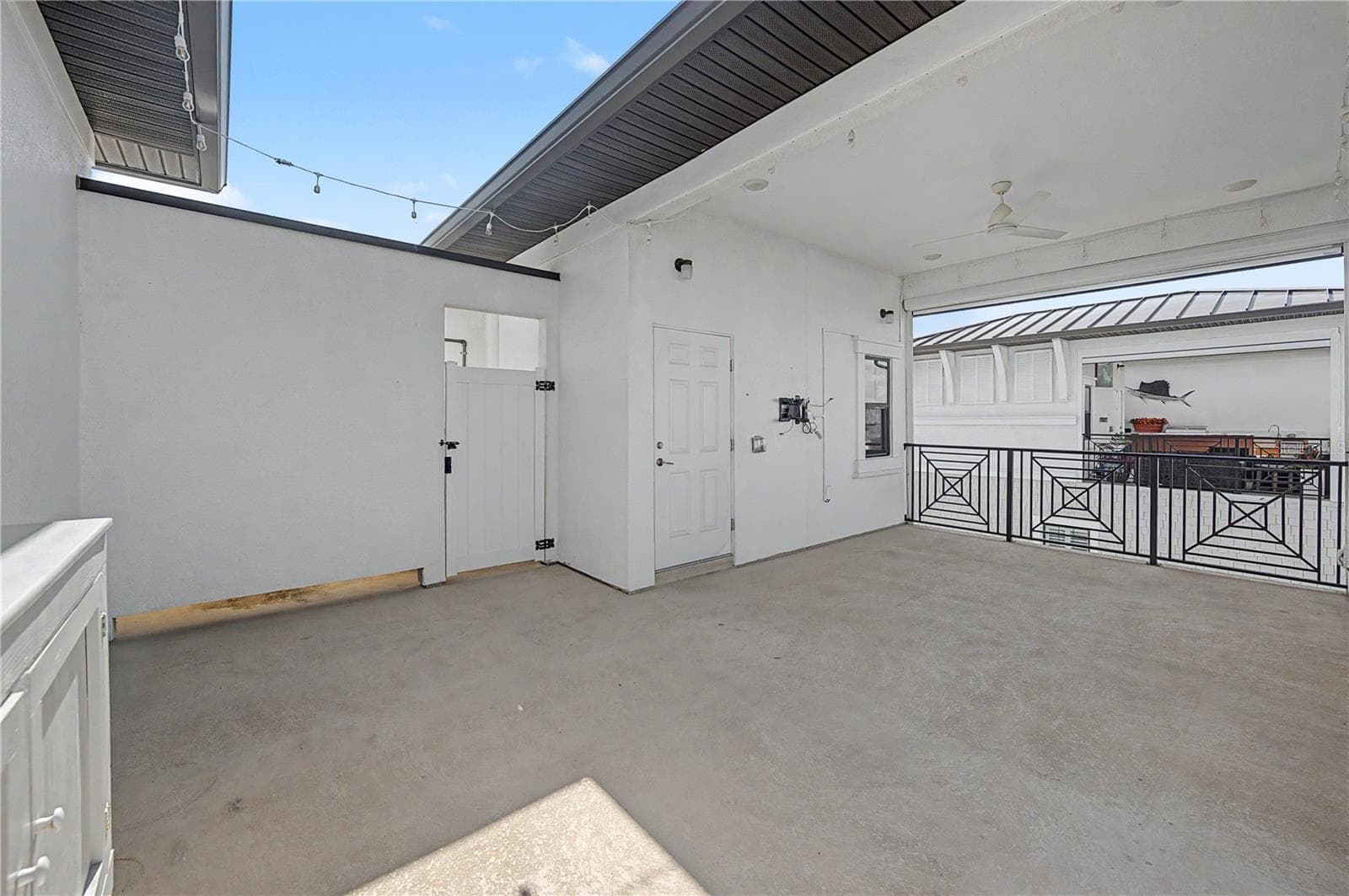 Fourth-level outdoor patio seating area. - 5351 BRIDGE ST #38, TAMPA