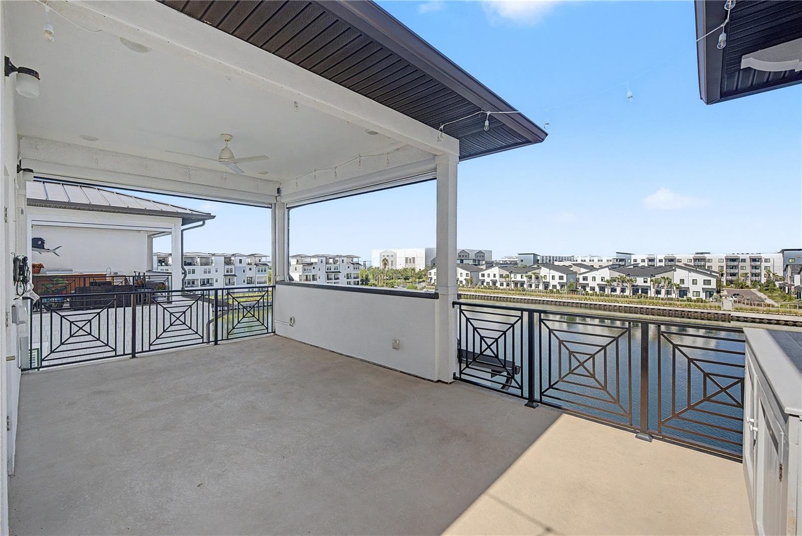 Fourth-level outdoor seating area with more beautiful water views. - 5351 BRIDGE ST #38, TAMPA