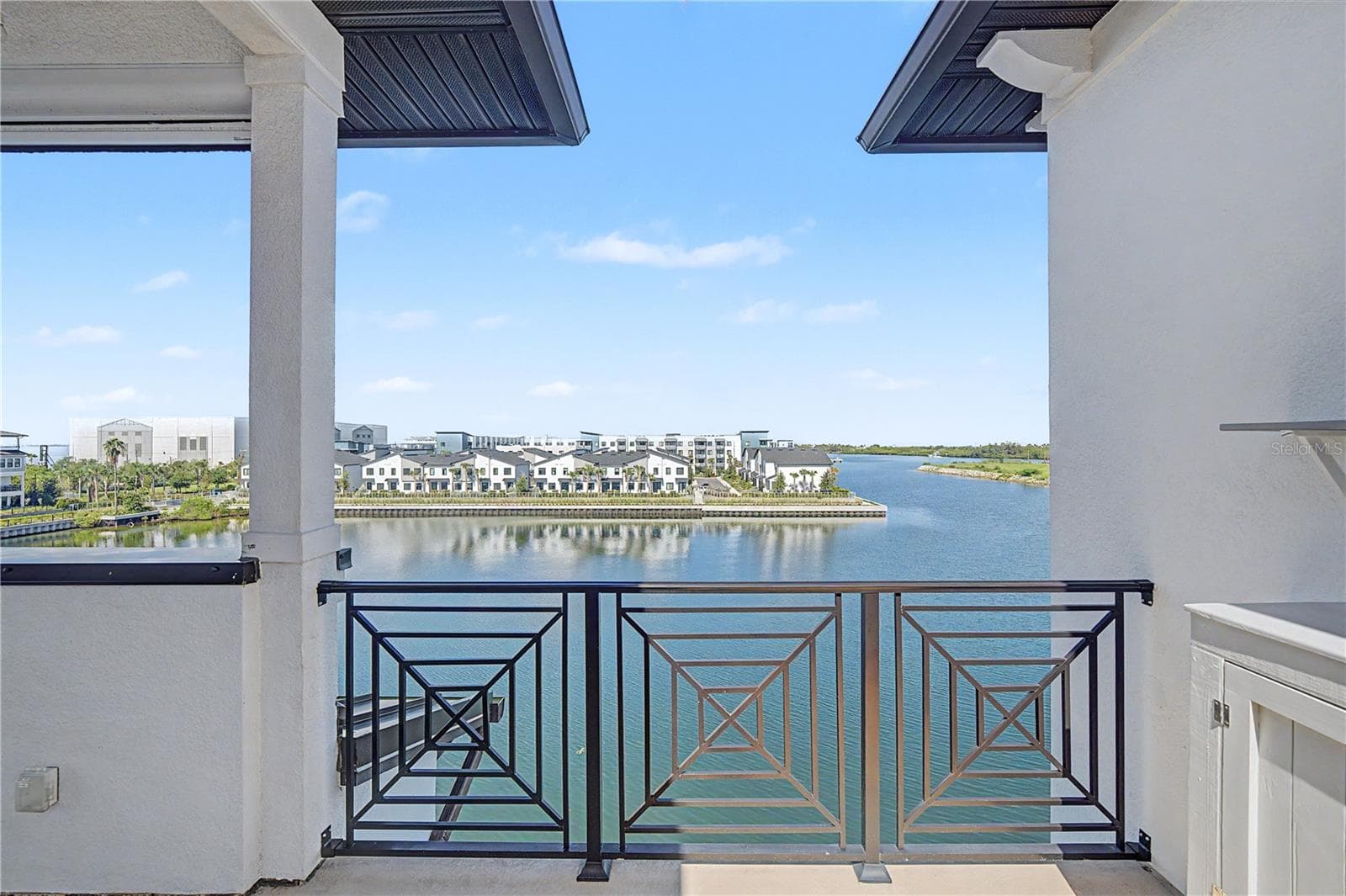 fourth-level patio with a scenic water view. - 5351 BRIDGE ST #38, TAMPA
