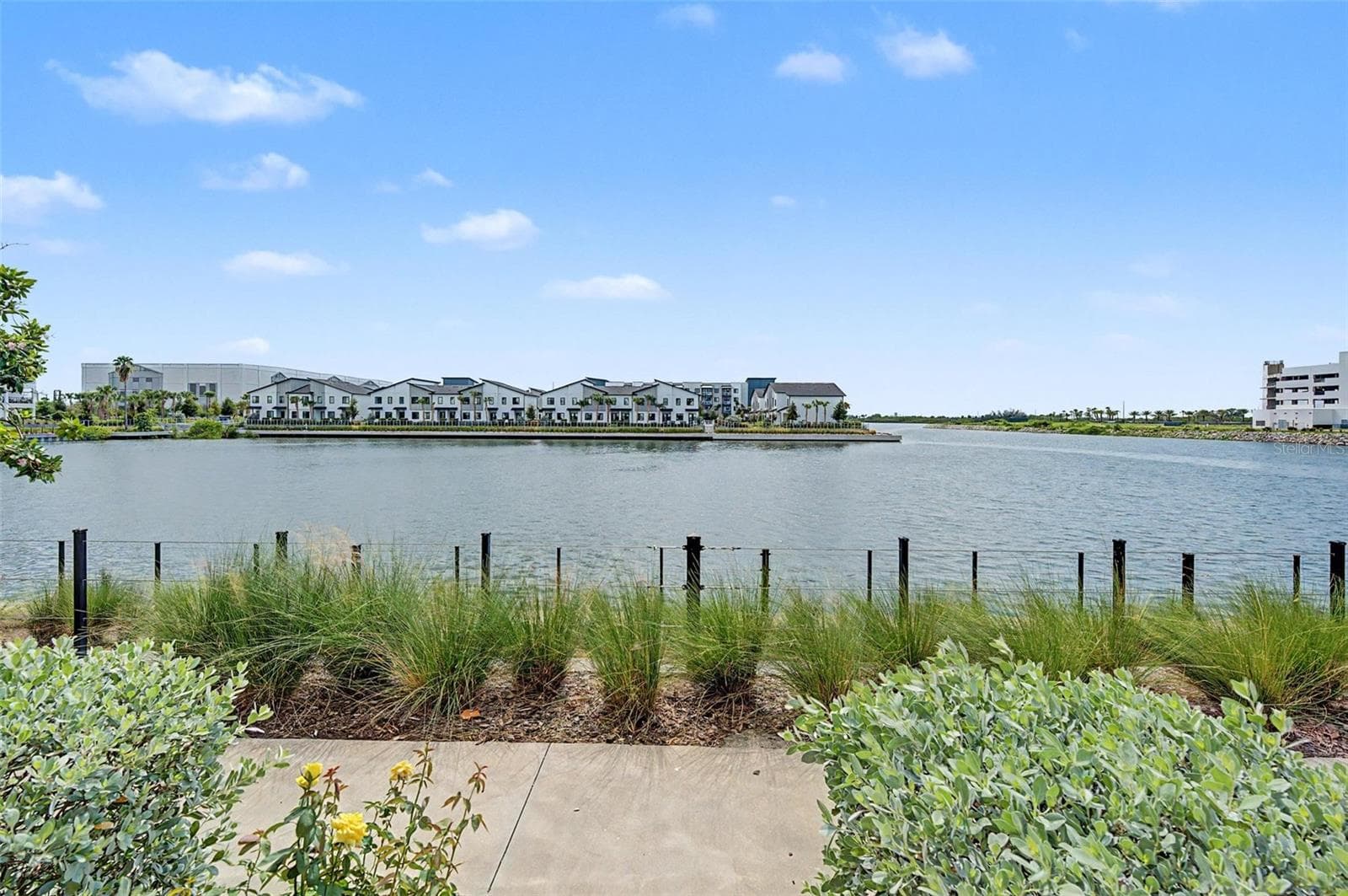First-level patio with amazing water views. - 5351 BRIDGE ST #38, TAMPA