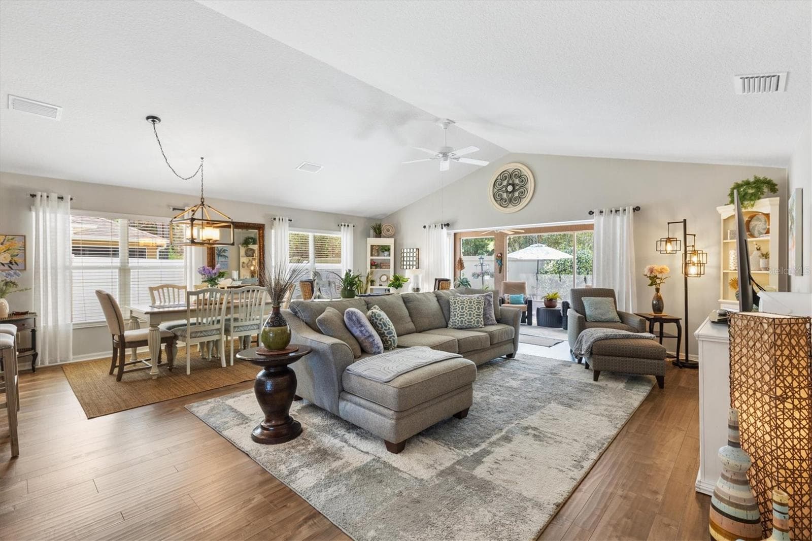 Open great room with kitchen, dining room and living room. - 2334 ROSE ARBOR ST, THE VILLAGES