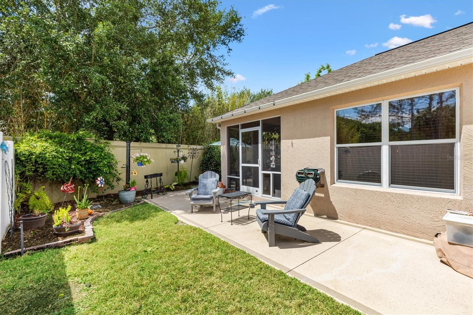 The side of the house. - 2334 ROSE ARBOR ST, THE VILLAGES