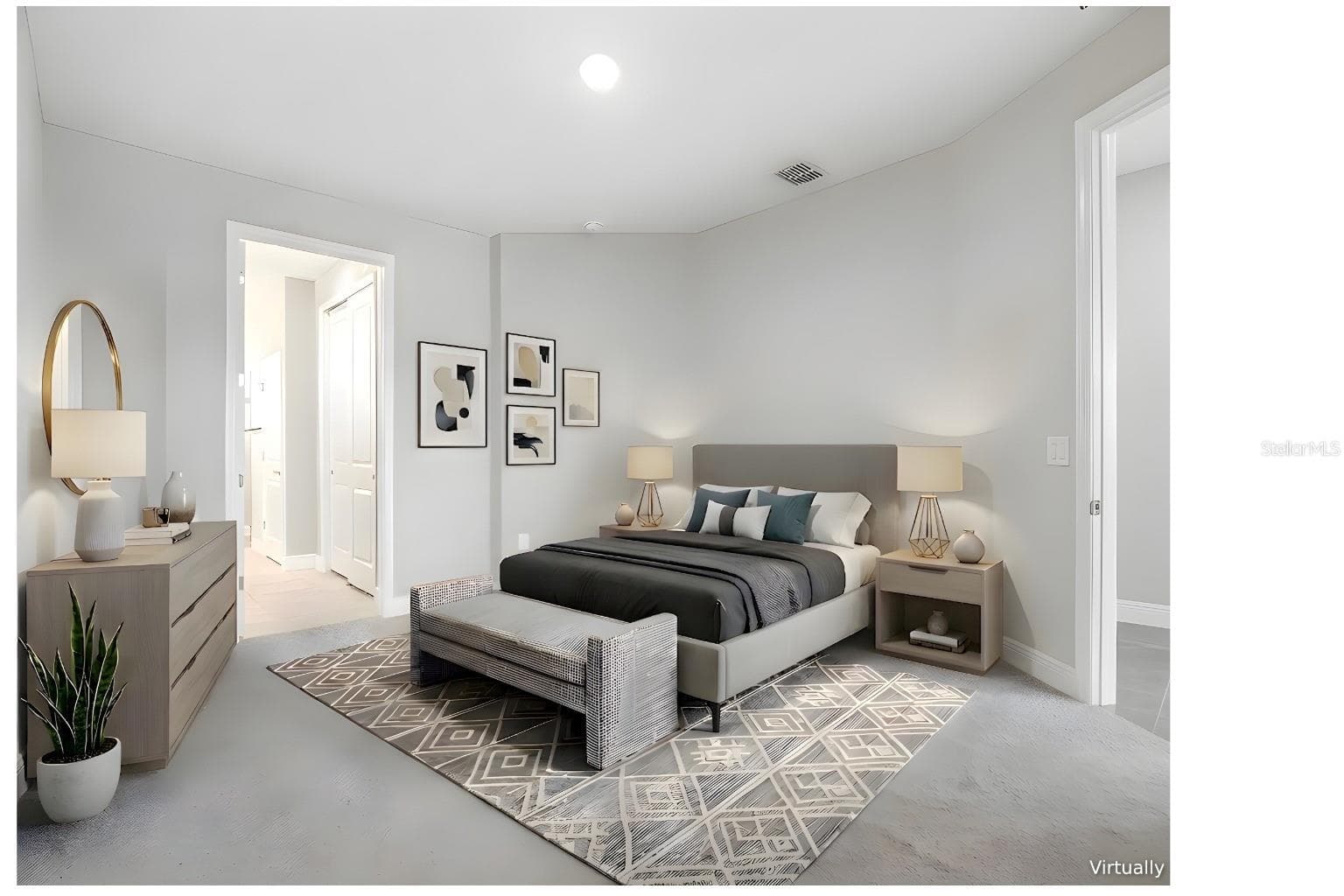 AI staged primary bedroom on first floor with ensuite bathroom - 5282 NEIL DR, ST PETERSBURG