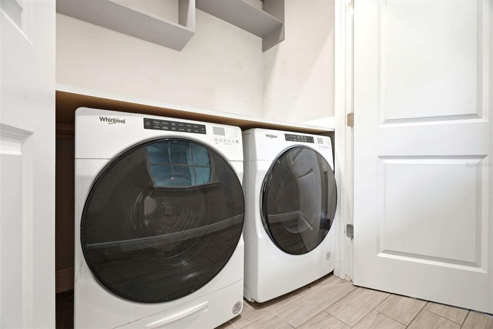 Laundry center located on first floor - 5282 NEIL DR, ST PETERSBURG