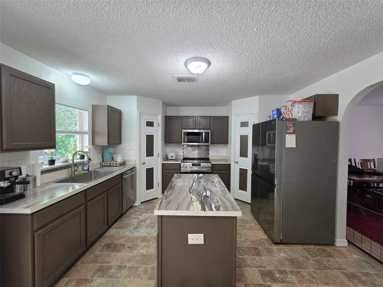 Single Family Residence at 9055 PEMBERTON ST, SPRING HILL, photo 6 of 31