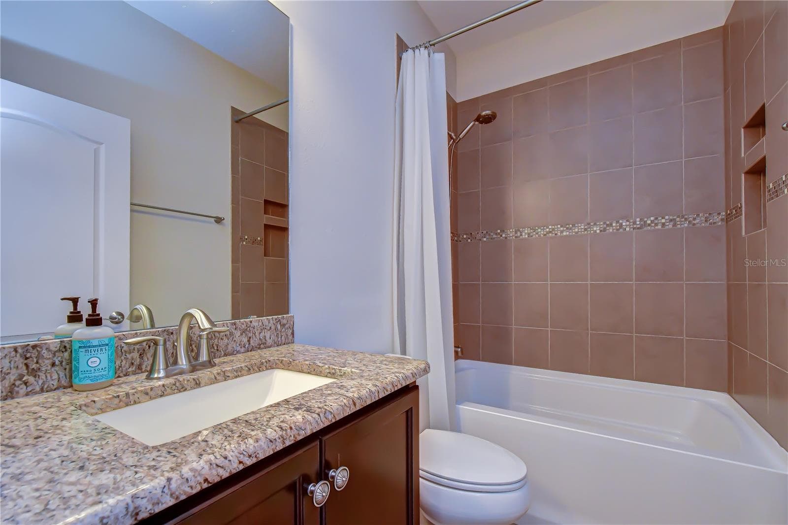 Convenient full bath features granite countertops - 826 VINO VERDE CIR, BRANDON