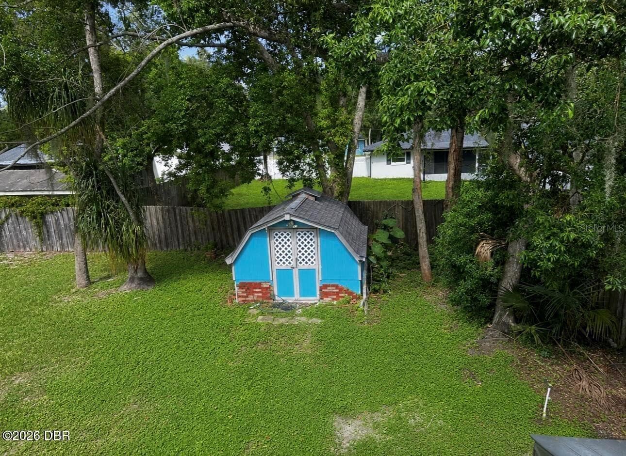 Shed to right side of Huge Back Yard - 31109 DEAL DR, MOUNT PLYMOUTH
