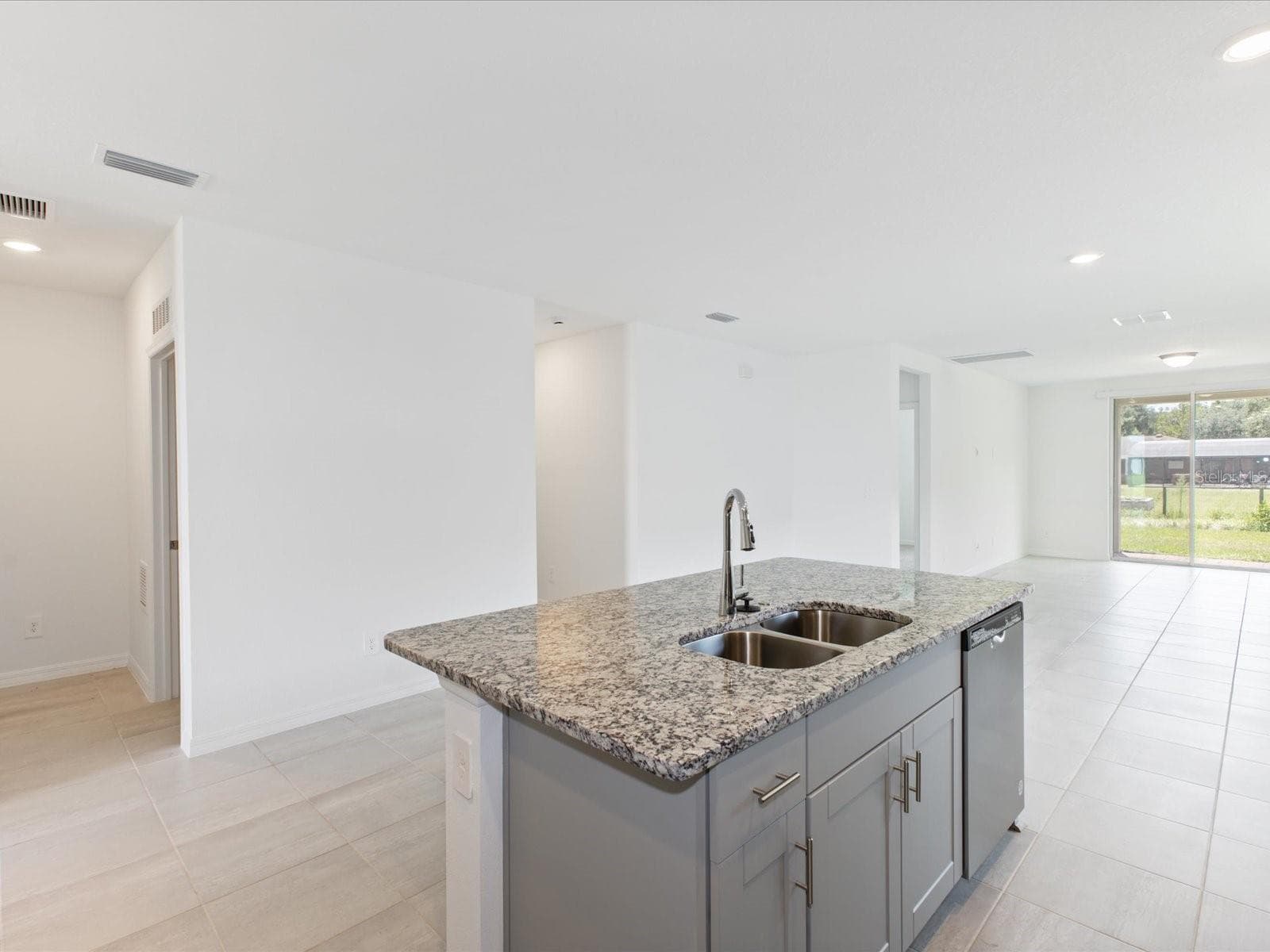 Photo is not of the actual home, but is an inspirational photo of builder’s model home and may depict options, furnishings, and/or decorator features that are not included. - 4542 EAGLE PERCH CT, ST CLOUD