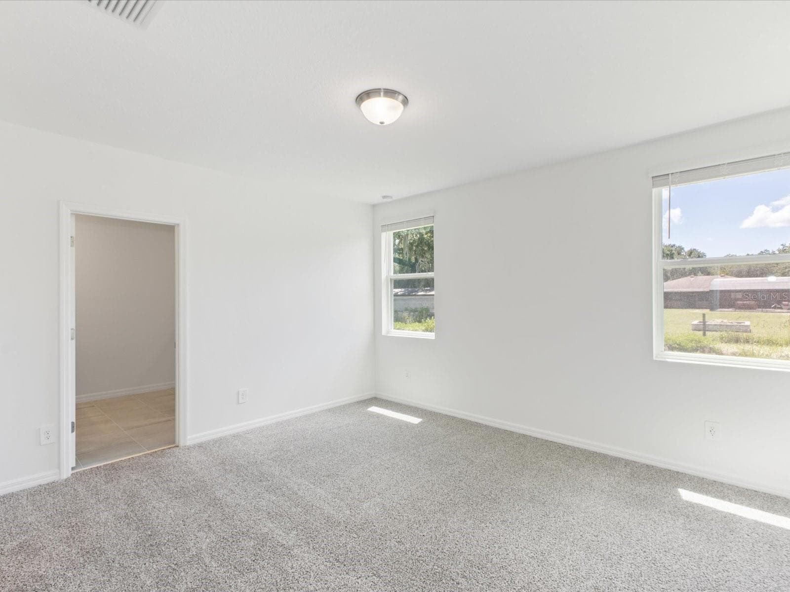 Photo is not of the actual home, but is an inspirational photo of builder’s model home and may depict options, furnishings, and/or decorator features that are not included. - 4542 EAGLE PERCH CT, ST CLOUD