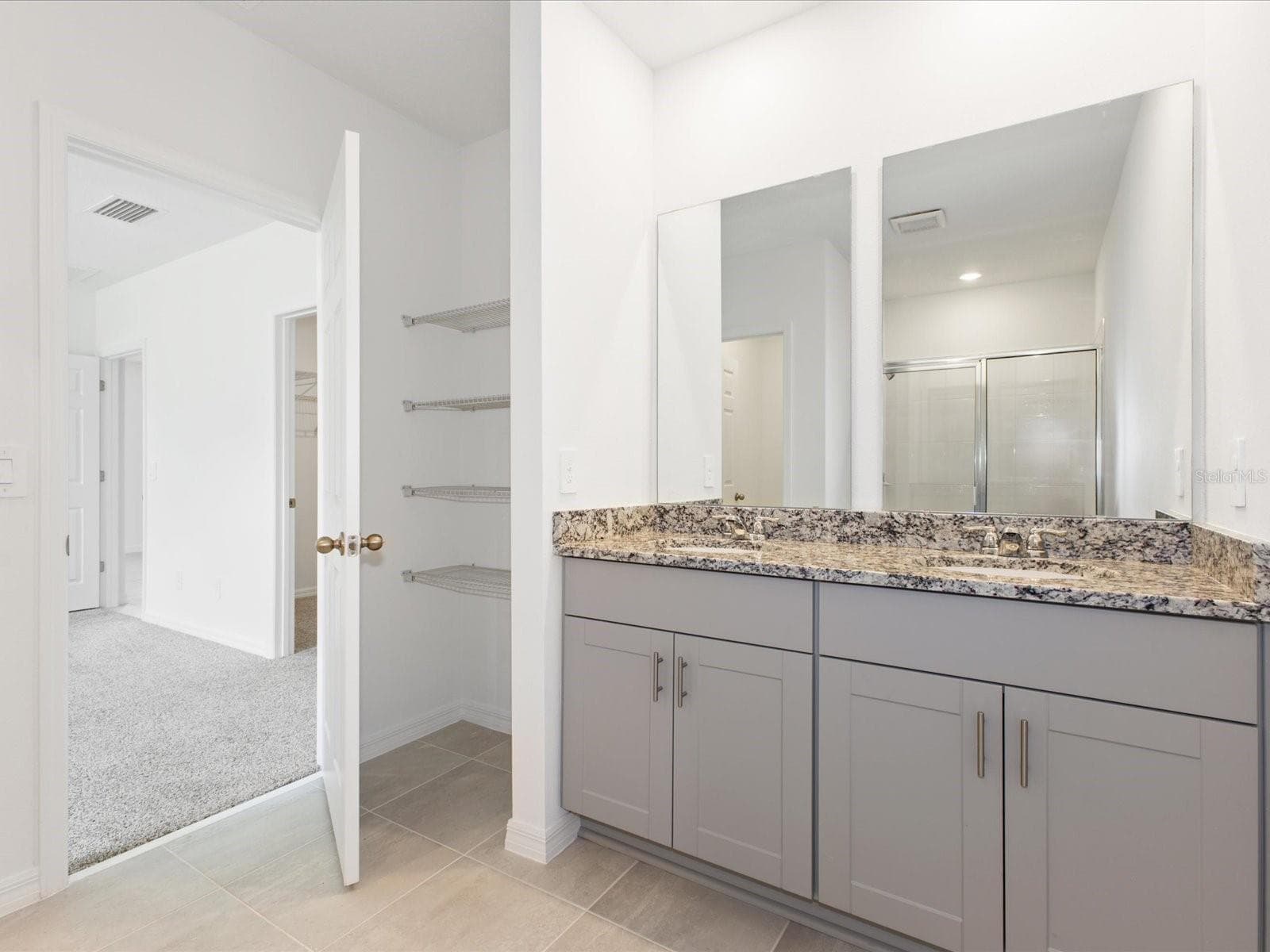 Photo is not of the actual home, but is an inspirational photo of builder’s model home and may depict options, furnishings, and/or decorator features that are not included. - 4542 EAGLE PERCH CT, ST CLOUD