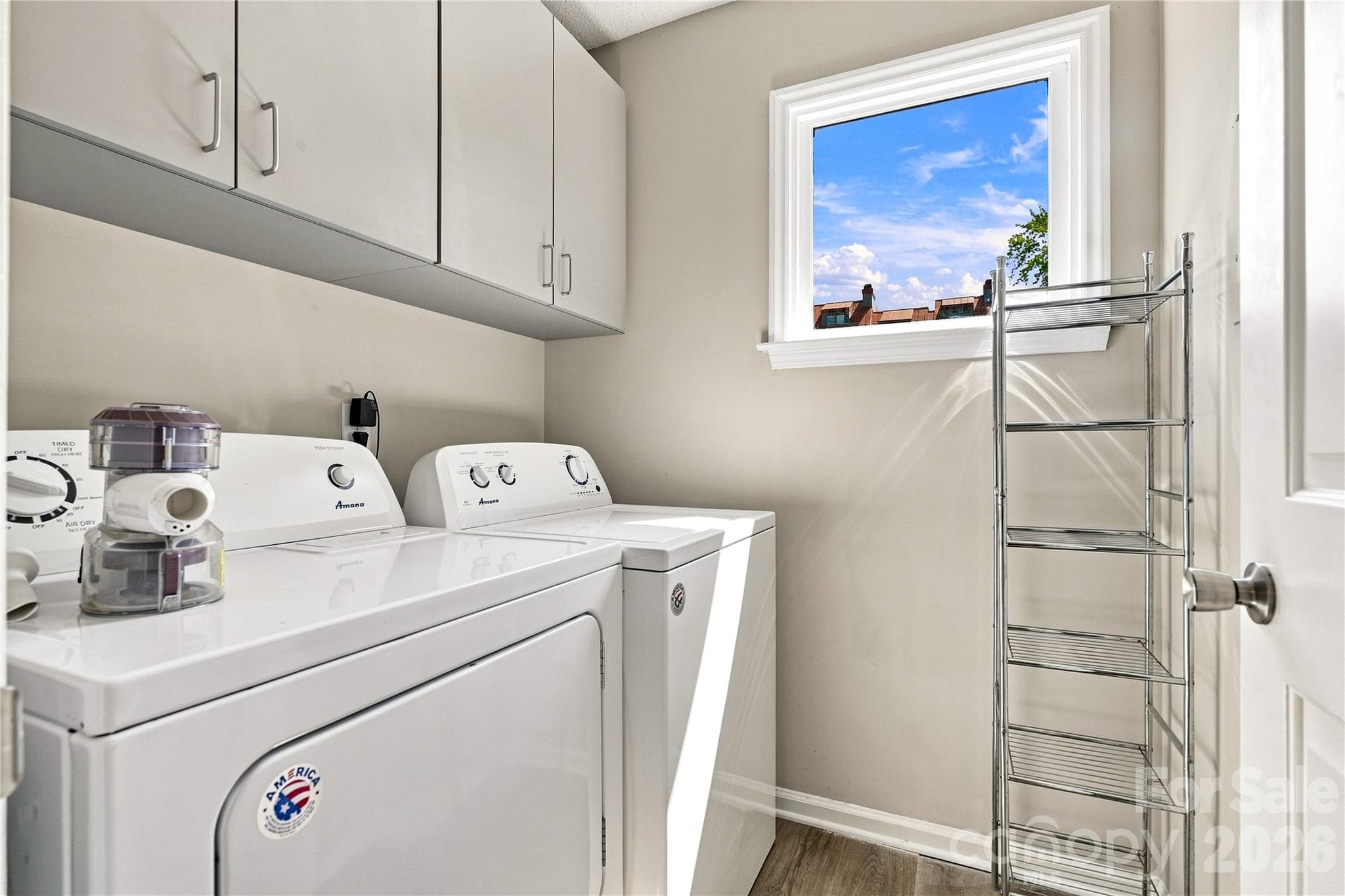 Laundry room with cabinets - 9031 J M Keynes Drive, Charlotte