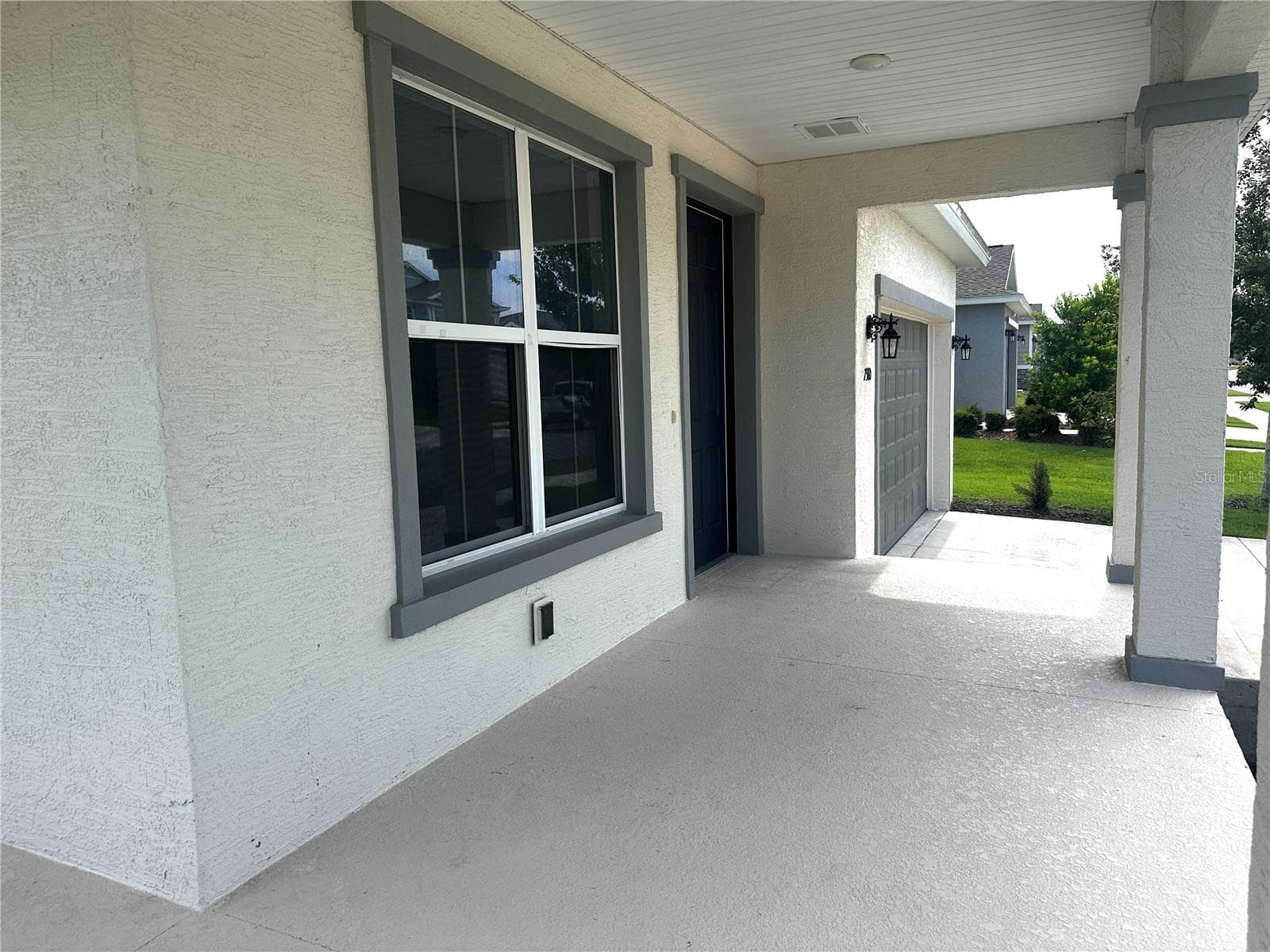large front and side porch - 7580 SW 63RD LANE RD, OCALA