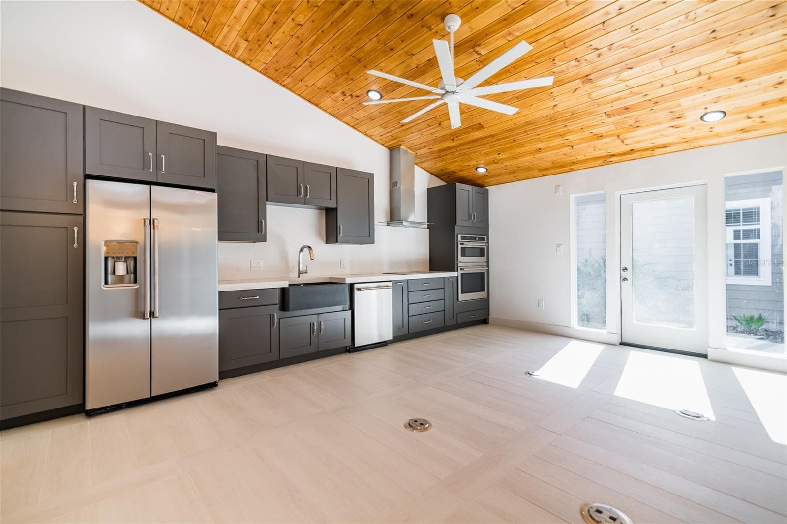 Kitchen and open areabefore furniture. - 6757 AMANDA VISTA CIR, LAND O LAKES