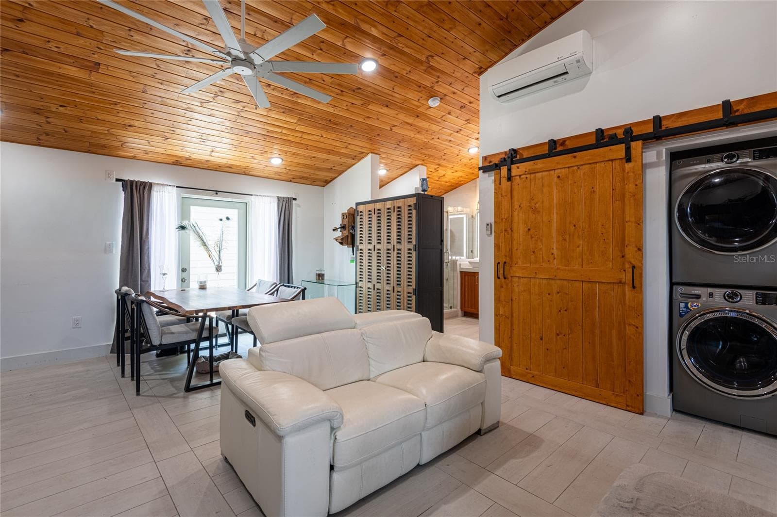 Picture showing the barn doors open. - 6757 AMANDA VISTA CIR, LAND O LAKES