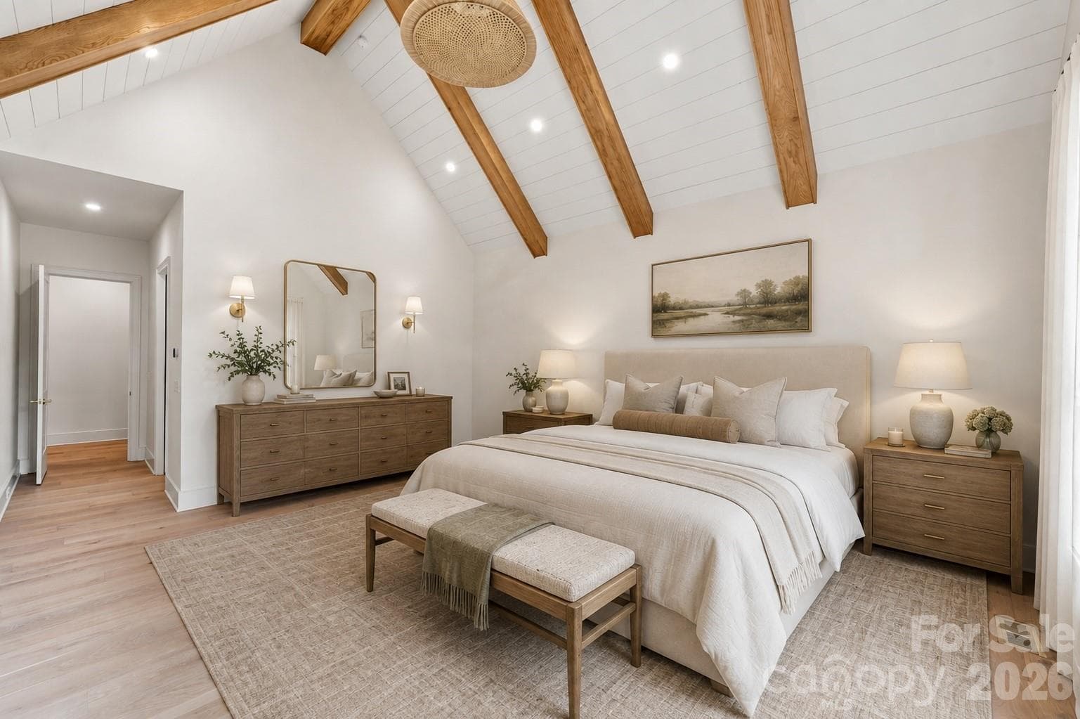 Vaulted main-level primary suite with architectural beams and a private retreat feel. - Select imagery has been thoughtfully enhanced to help communicate the architectural vision, lifestyle potential, and intended design experience of the home - 125 Randstone Court, Charlotte