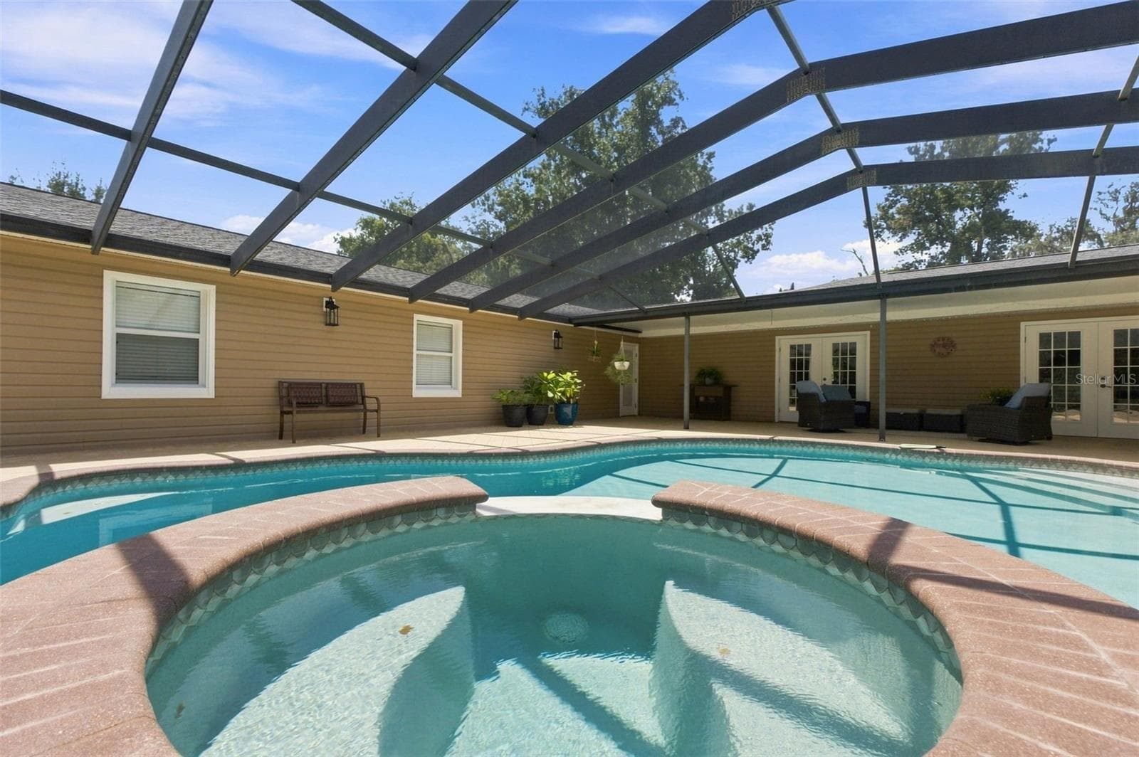 Screen enclosed pool with hot tub - 23458 CROOM RD, BROOKSVILLE