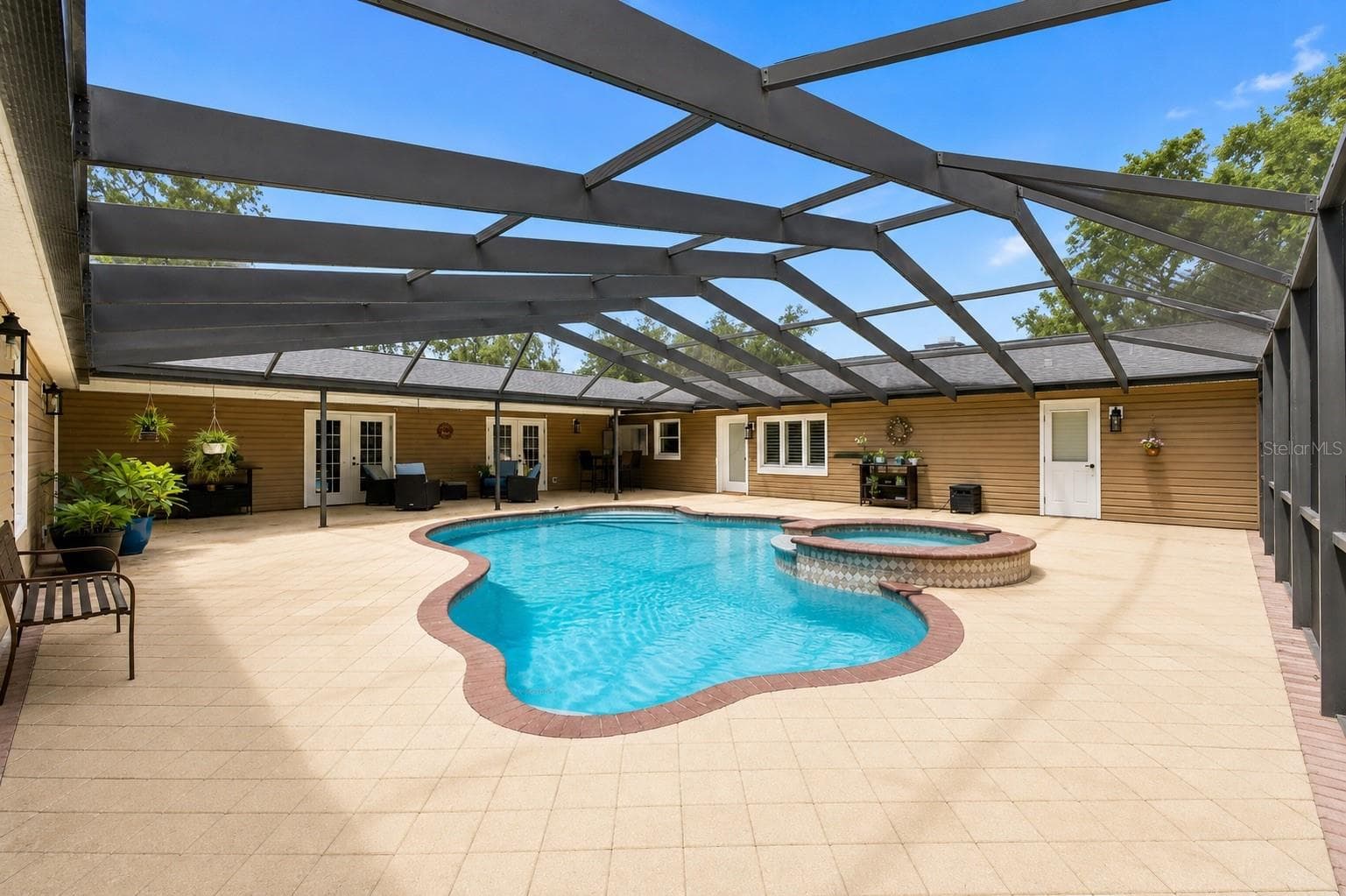 Screen enclosed pool with hot tub - 23458 CROOM RD, BROOKSVILLE