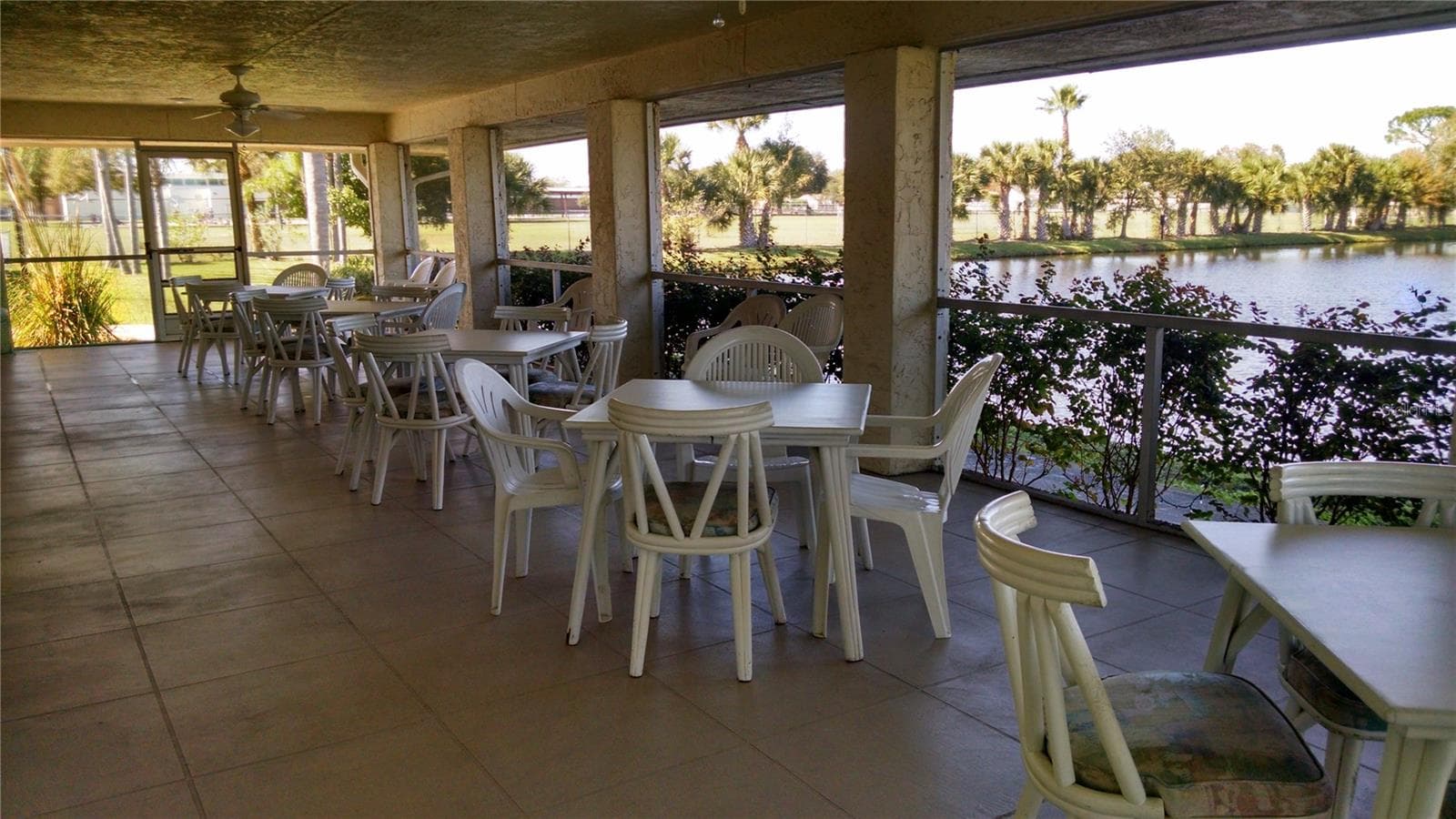 Clubhouse screened patio - 5355 FERNDALE PL N, PINELLAS PARK