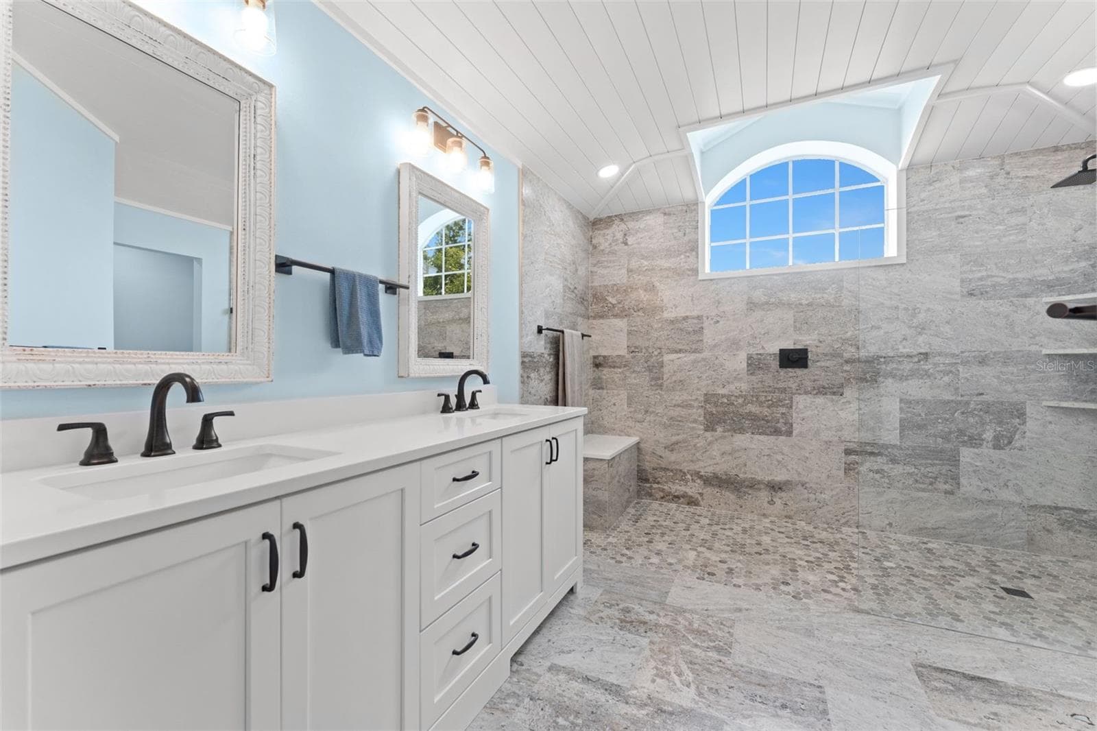 Primary bathroom with  "wet room" shower. - 846 MARLEY DR, PORT ORANGE