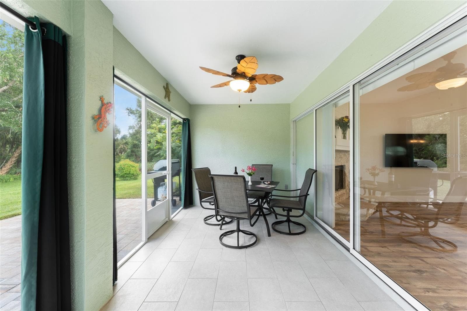 Screened in lanai with collapsing/stacking sliders. - 846 MARLEY DR, PORT ORANGE