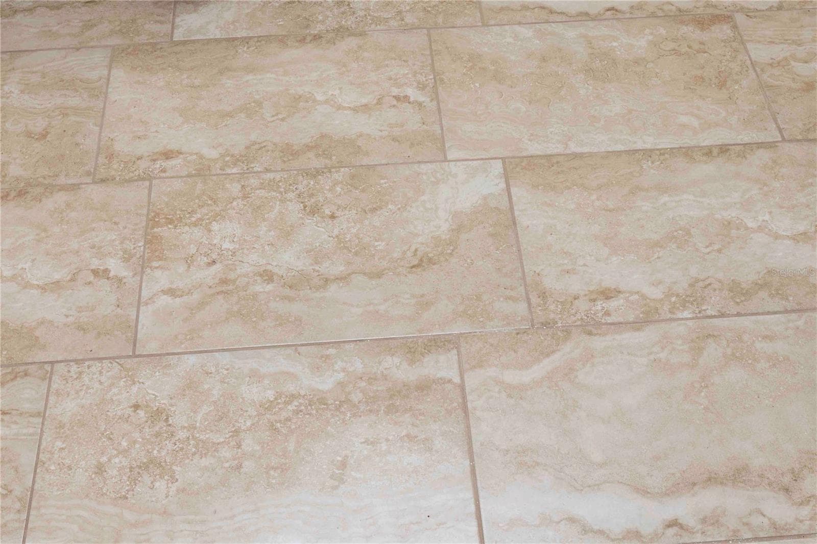 New 12 by 24 ceramic tiles in both bedrooms - 9639 GREENSKEEPER DR #9639, NEW PORT RICHEY