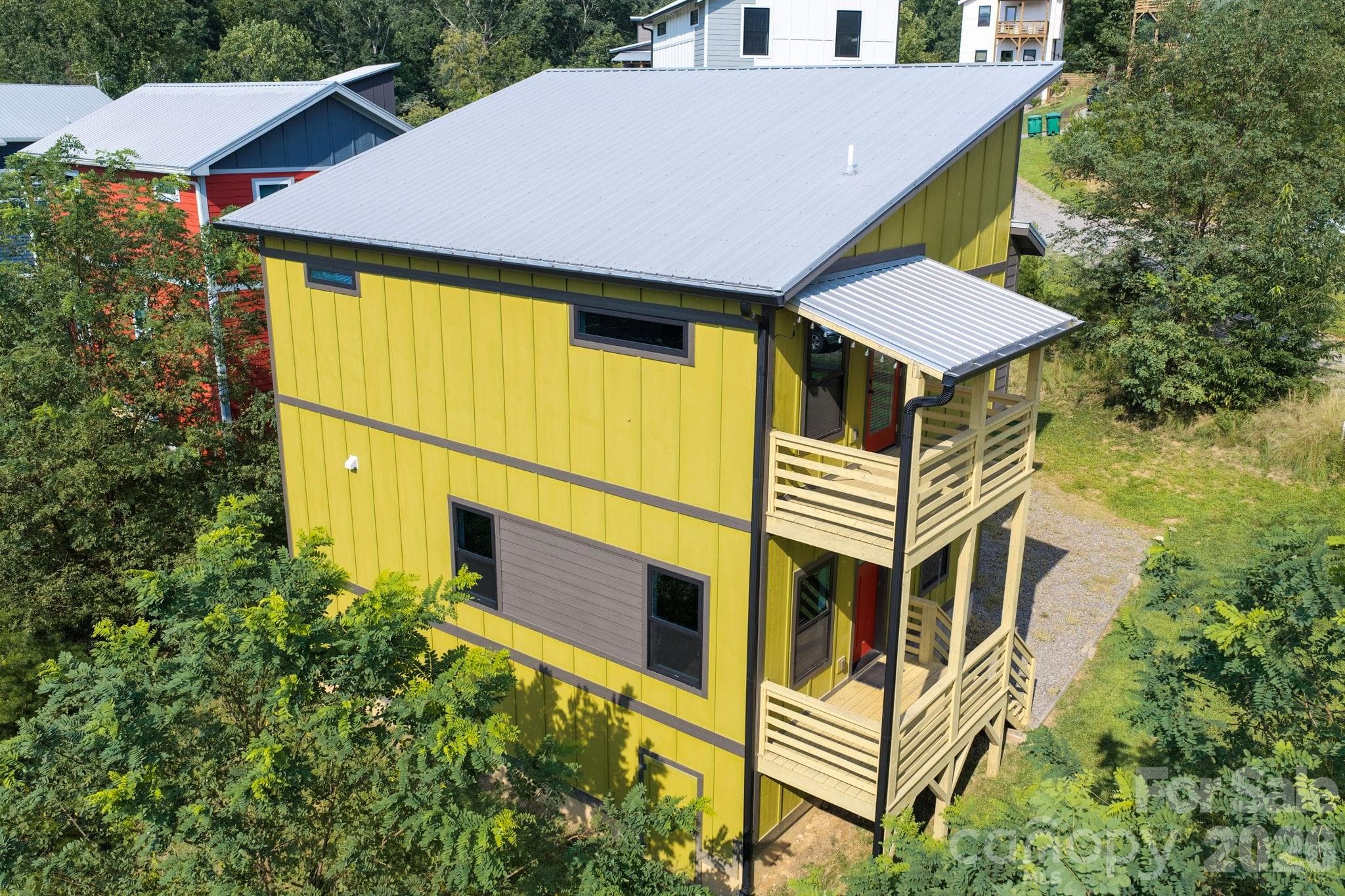 Modern green-built home featuring energy-efficient design with contemporary architecture and sustainable construction methods throughout. - 613 Salem Heights Lane, Swannanoa
