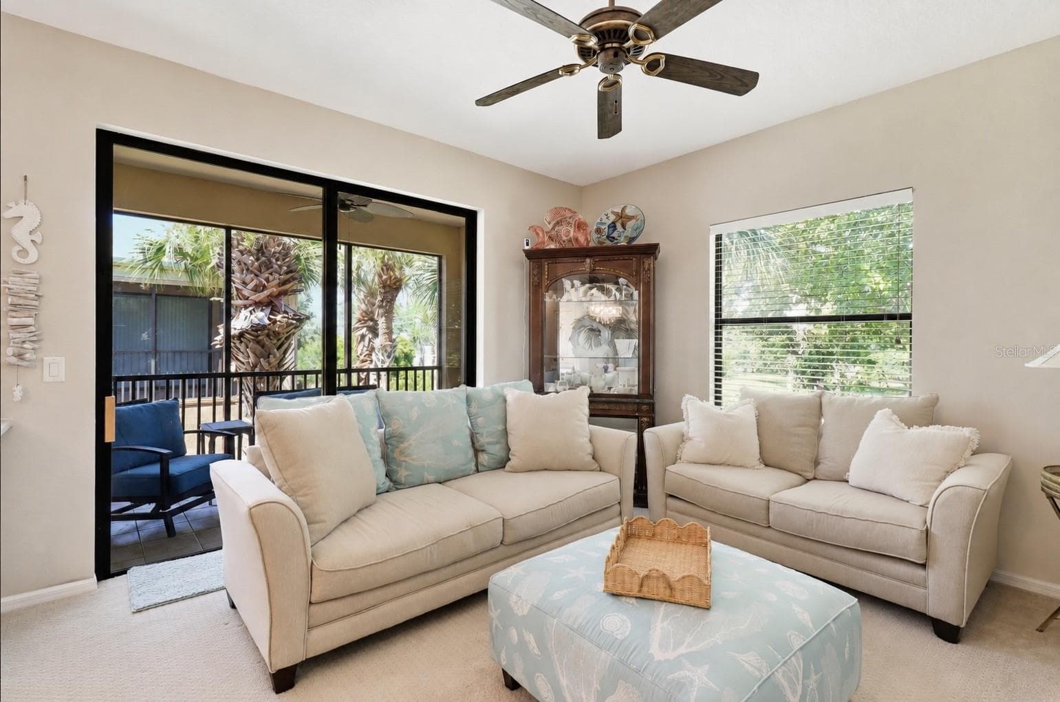 Living space with sliding door to porch - 4033 OVERTURE CIR, BRADENTON