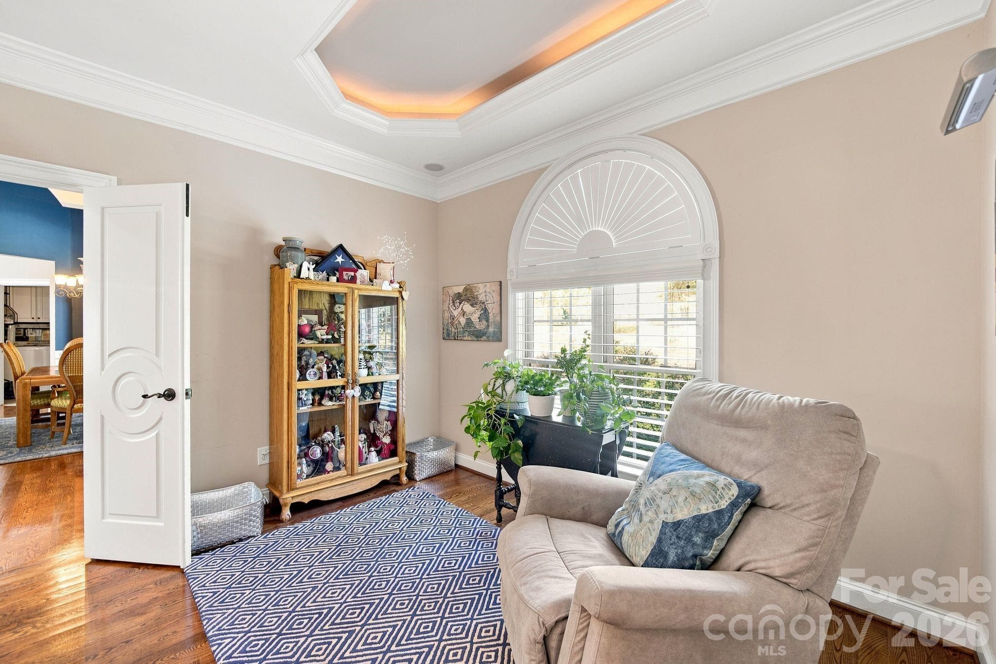 Create your own haven in the spacious sitting area of the primary suite. - 1001 Heritage Acres Drive, Weddington