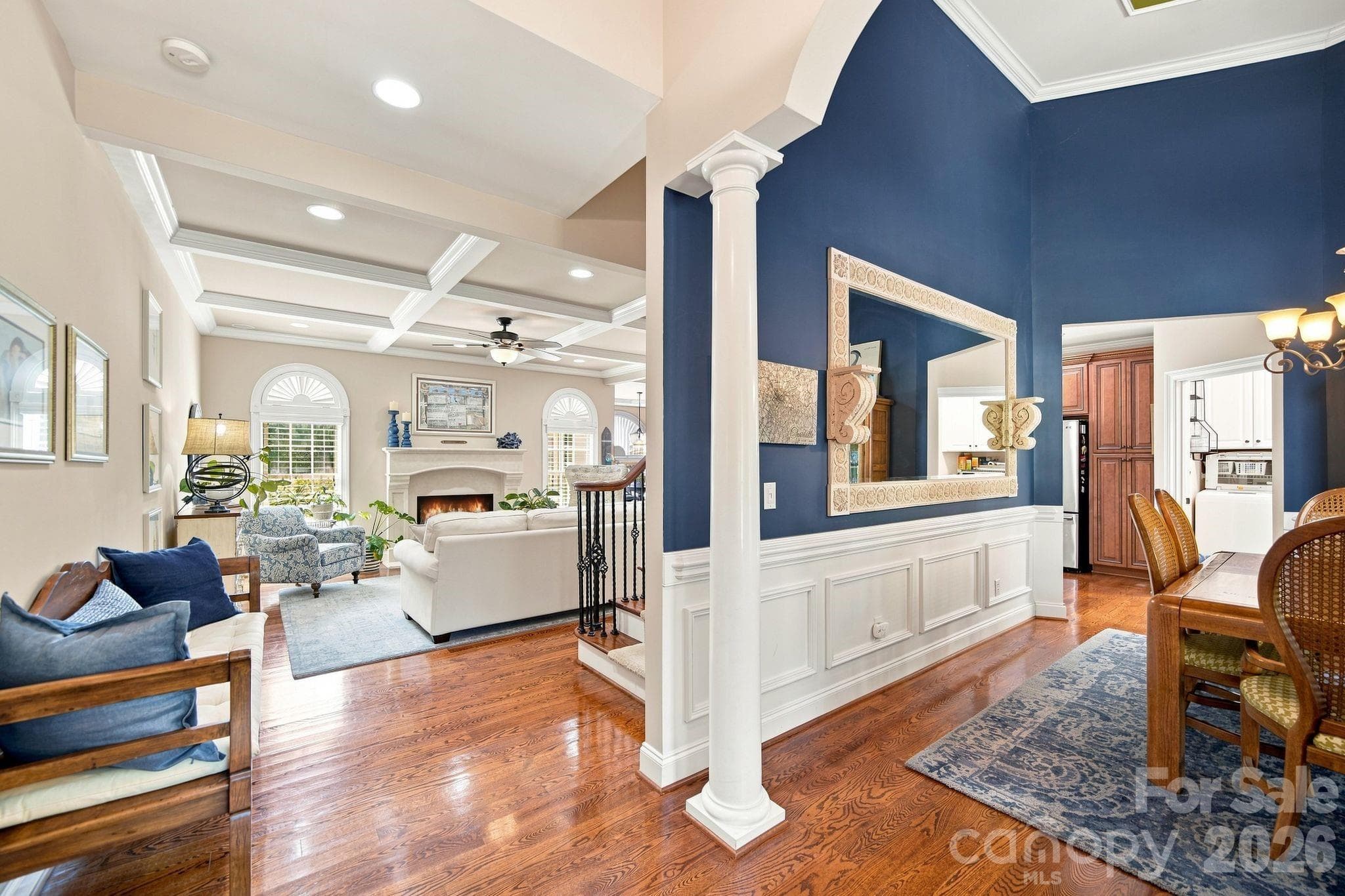 Experience the charm of custom features that truly set a home apart—such as stunning real wood floors, elegant wrought iron railings, and beautifully crafted coffered ceilings. These unique touches make them a sought-after treasure for discerning buyers. - 1001 Heritage Acres Drive, Weddington