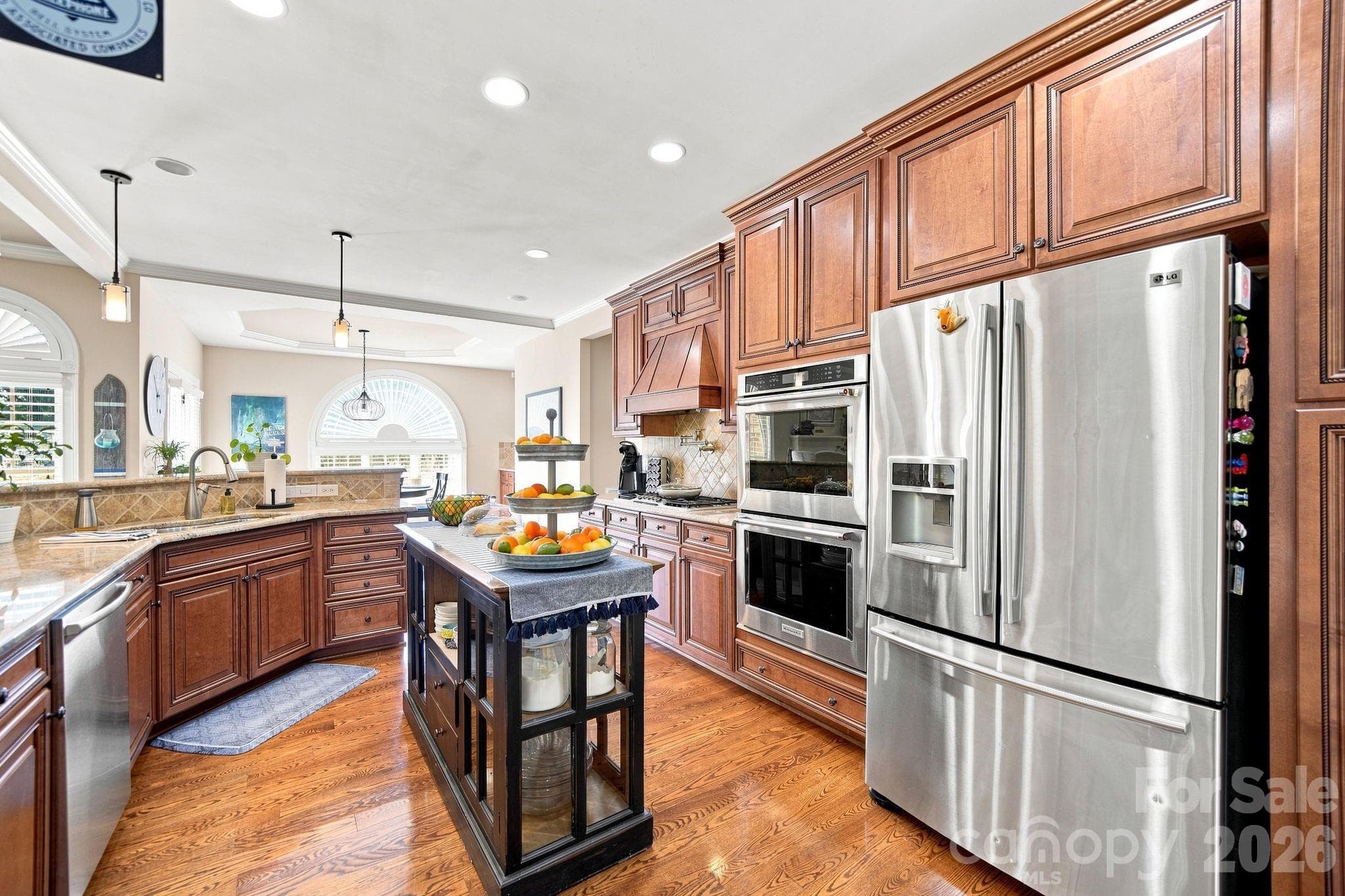 The island serves as a beautiful addition to the space; the seller is willing to include it in the sale with a competitive offer. - 1001 Heritage Acres Drive, Weddington