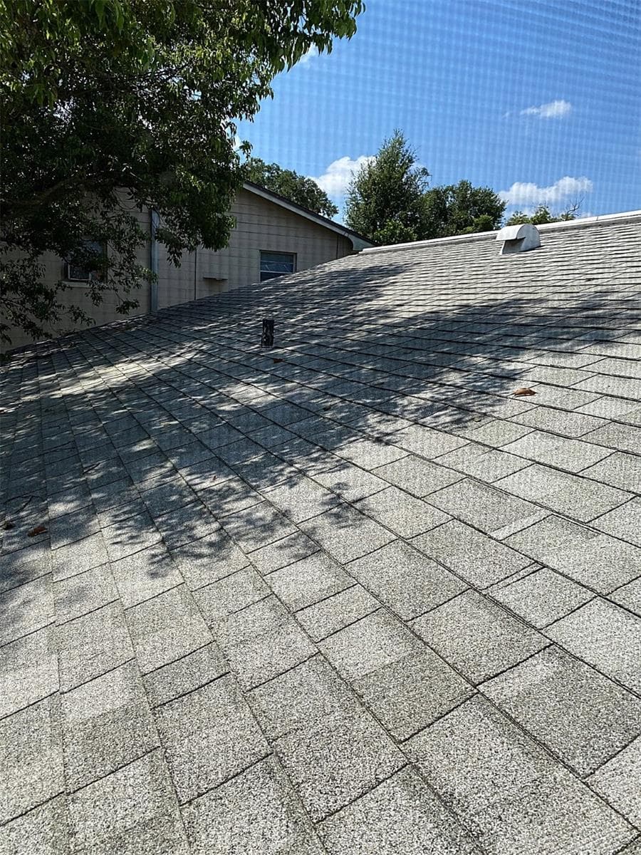 30 year shingle. Sorry took picture from bathroom window, screen musses up a bit - 626 ORCHID LN, ALTAMONTE SPRINGS