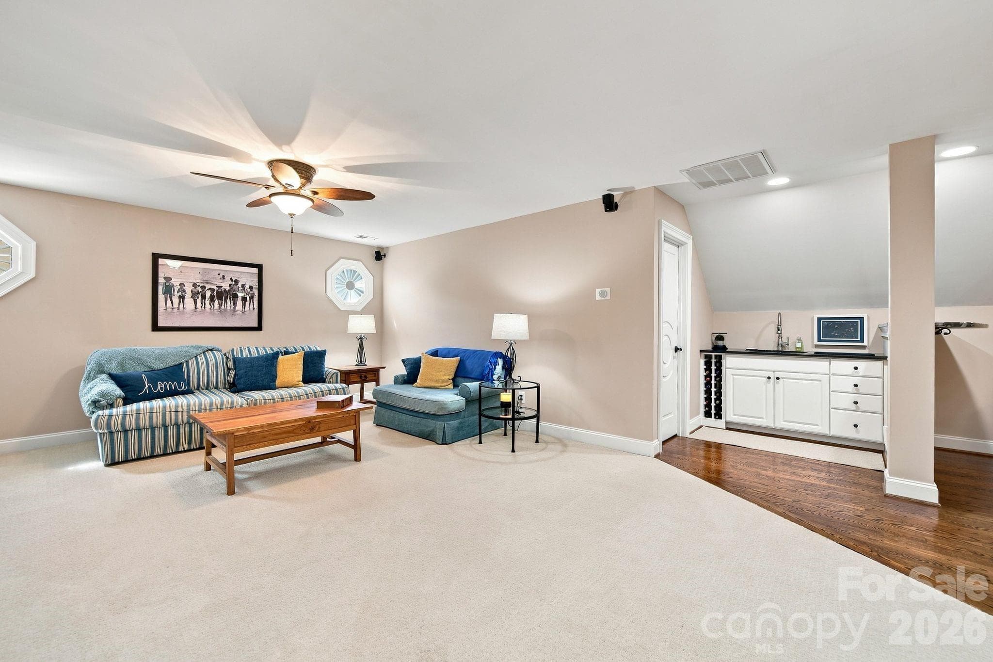 Upper level flex space with wet bar and tons of storage. - 1001 Heritage Acres Drive, Weddington