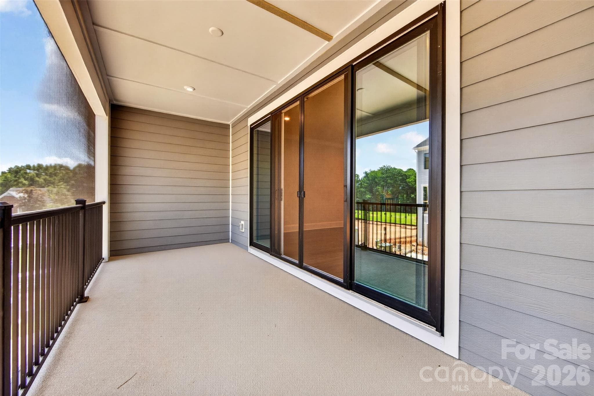 Second floor covered outdoor living - 6008 Yellow Buckeye Drive, Charlotte