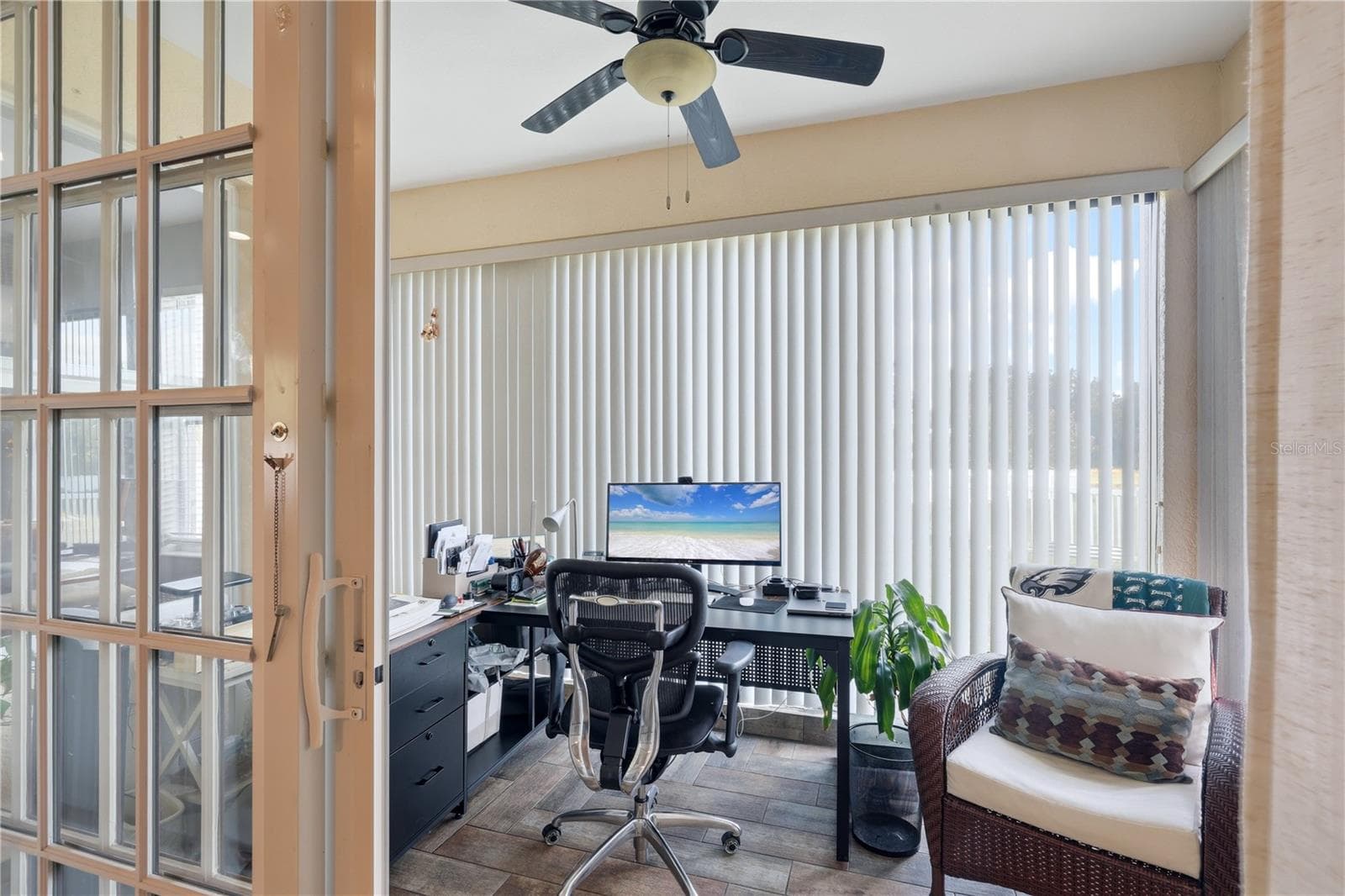 Florida room currently used as an office.  It is air conditioned space. - 5310 72ND ST E, PALMETTO