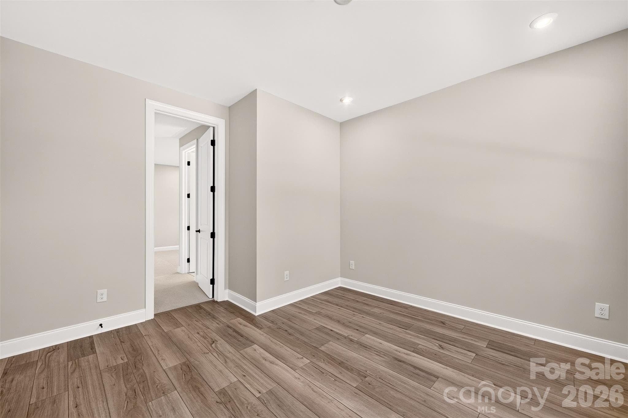 First floor GenSmart Suite living room - 6012 Yellow Buckeye Drive, Charlotte