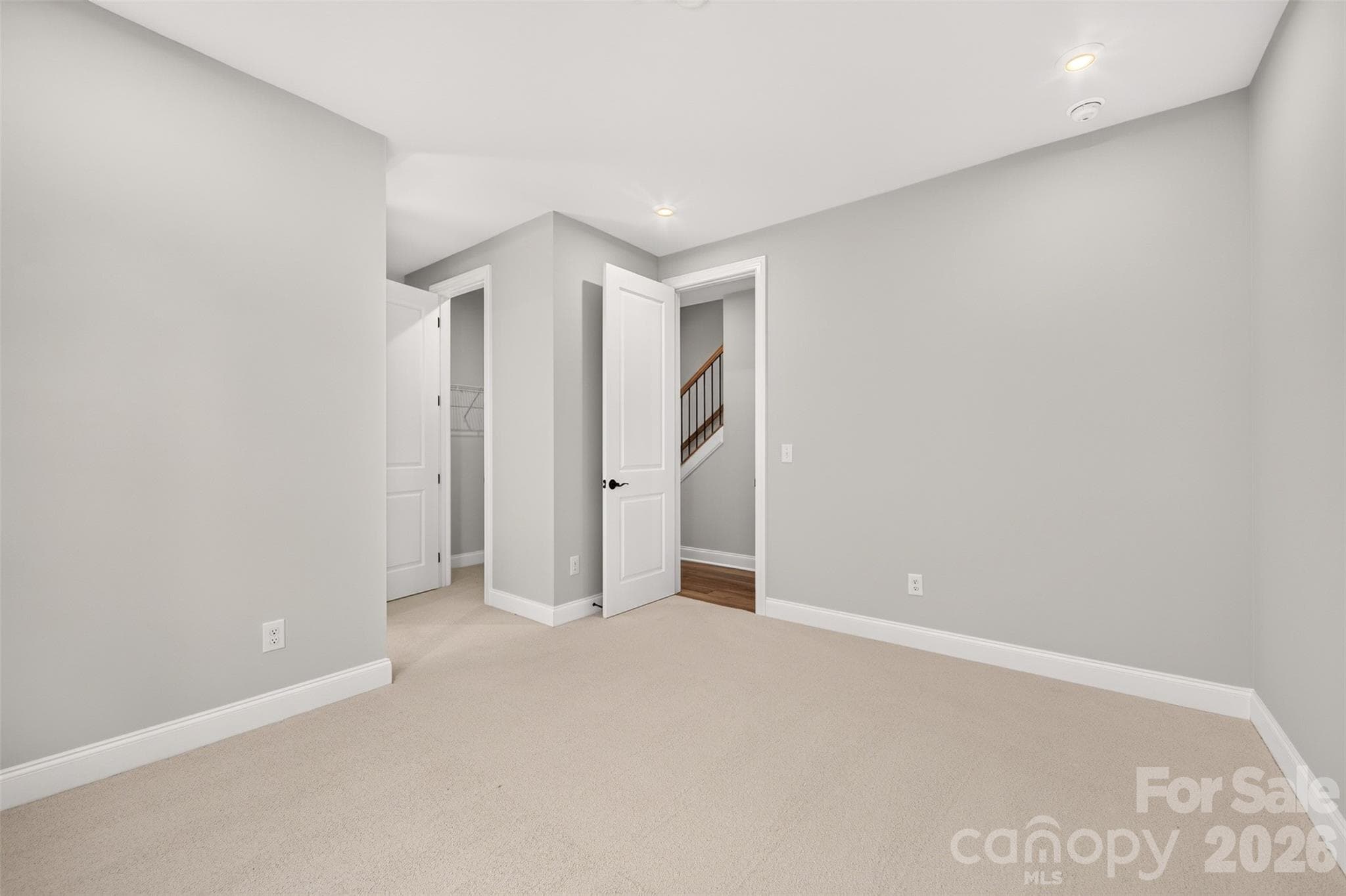 First floor GenSmart Suite Bedroom - 6012 Yellow Buckeye Drive, Charlotte