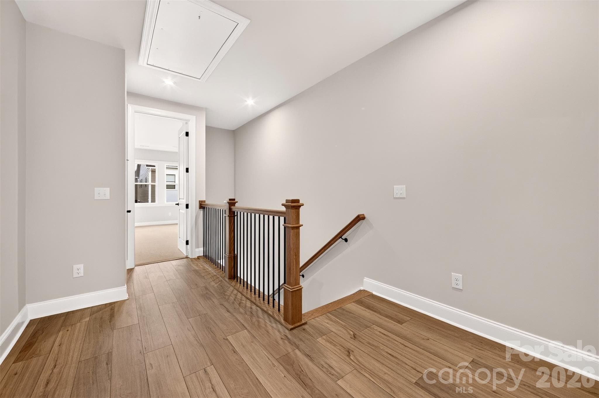 Third floor landing with vinyl flooring - 6012 Yellow Buckeye Drive, Charlotte