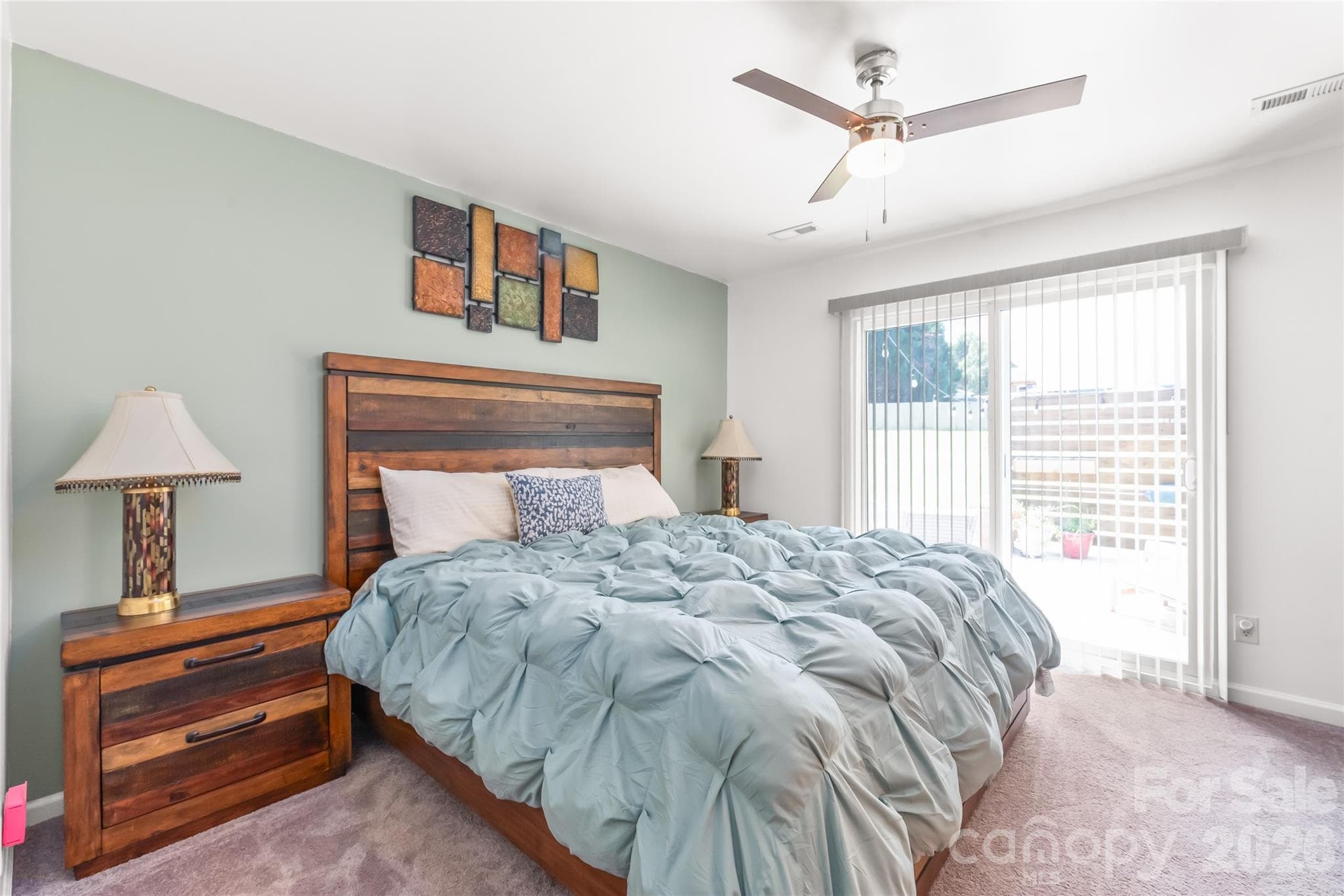 Main home primary bedroom has separate entrance to back patio - 2241 Indian Cross Trail, Matthews