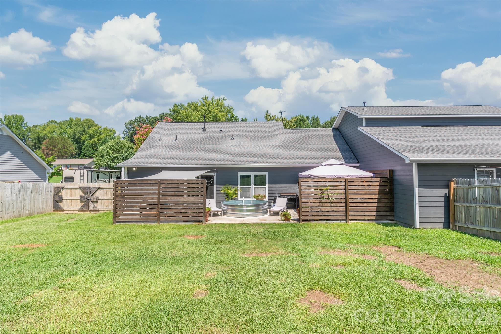 Huge back yard with privacy fence gives you room to do whatever you want. - 2241 Indian Cross Trail, Matthews
