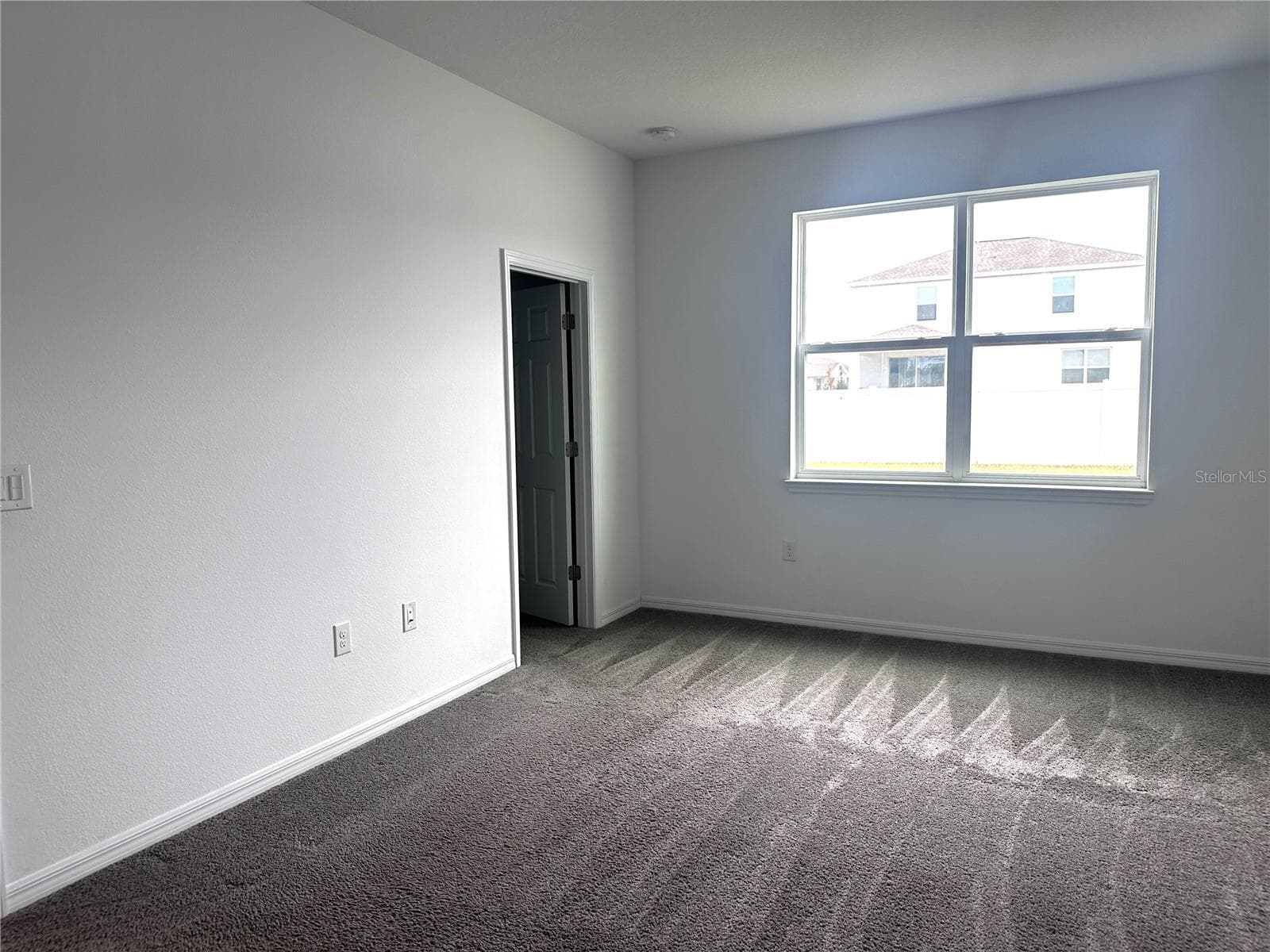 primary bedroom with ensuite and walk in closet - 7580 SW 63RD LANE RD, OCALA