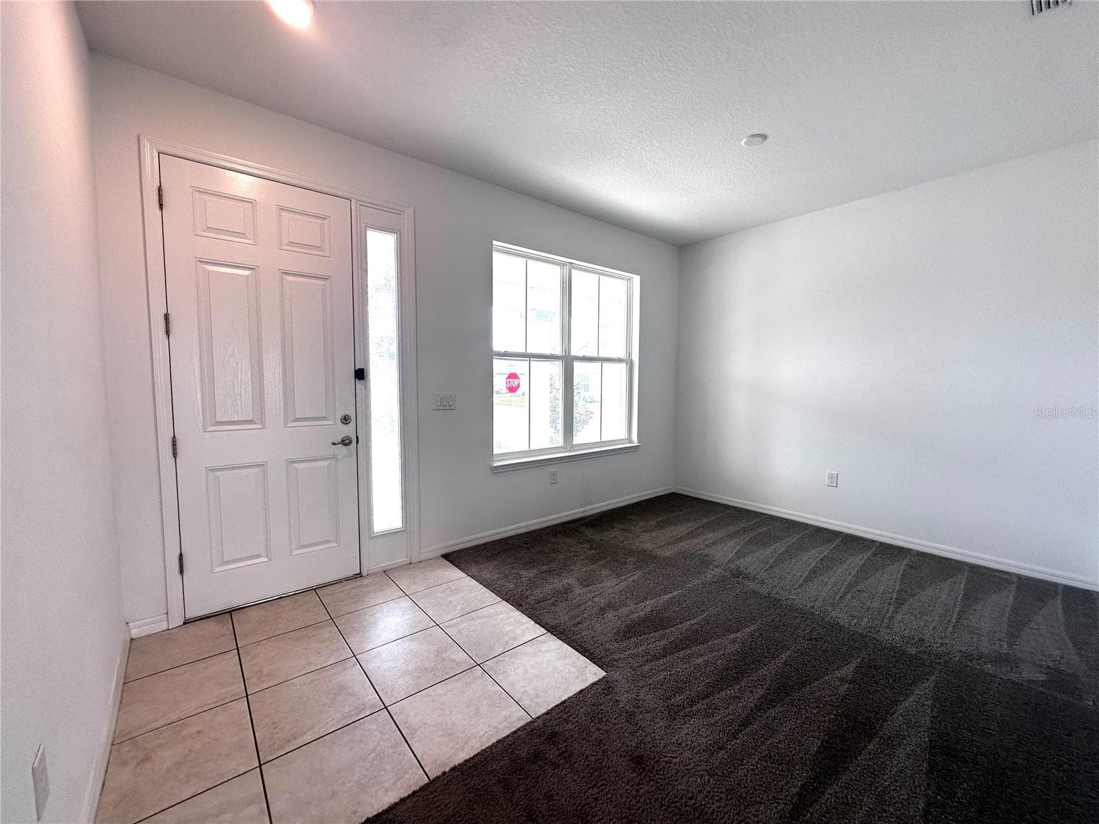 front entry and sitting room - 7580 SW 63RD LANE RD, OCALA