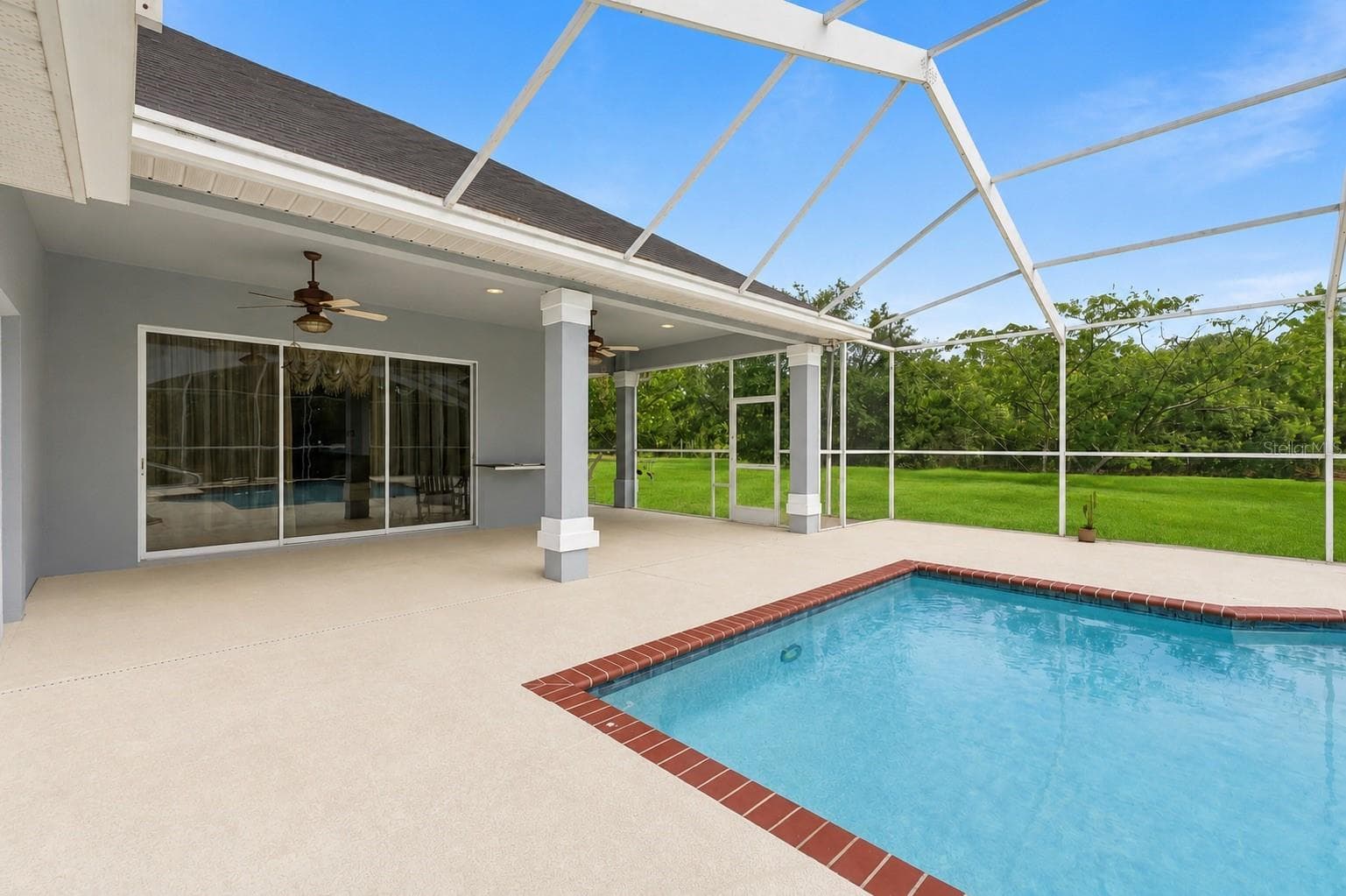Screen enclosed pool - 11200 WOODLAND WATERS BLVD, WEEKI WACHEE